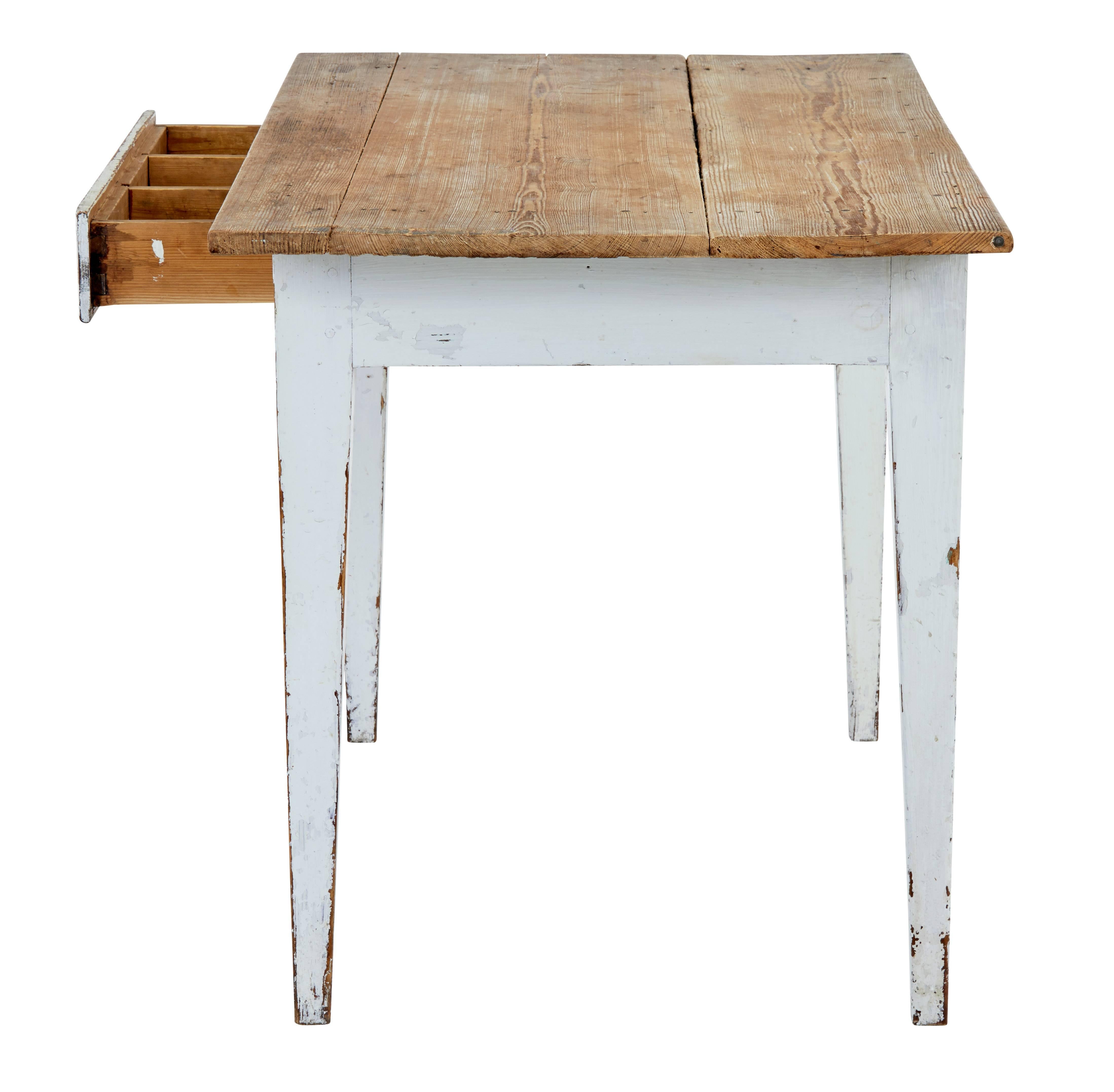 Rustic Swedish kitchen table, circa 1880.

With the Swedish being renowned for their elegant furniture they are also known for their practical and rustic furniture.

Scrubbed pine three-piece top with painted base and a single drawer for