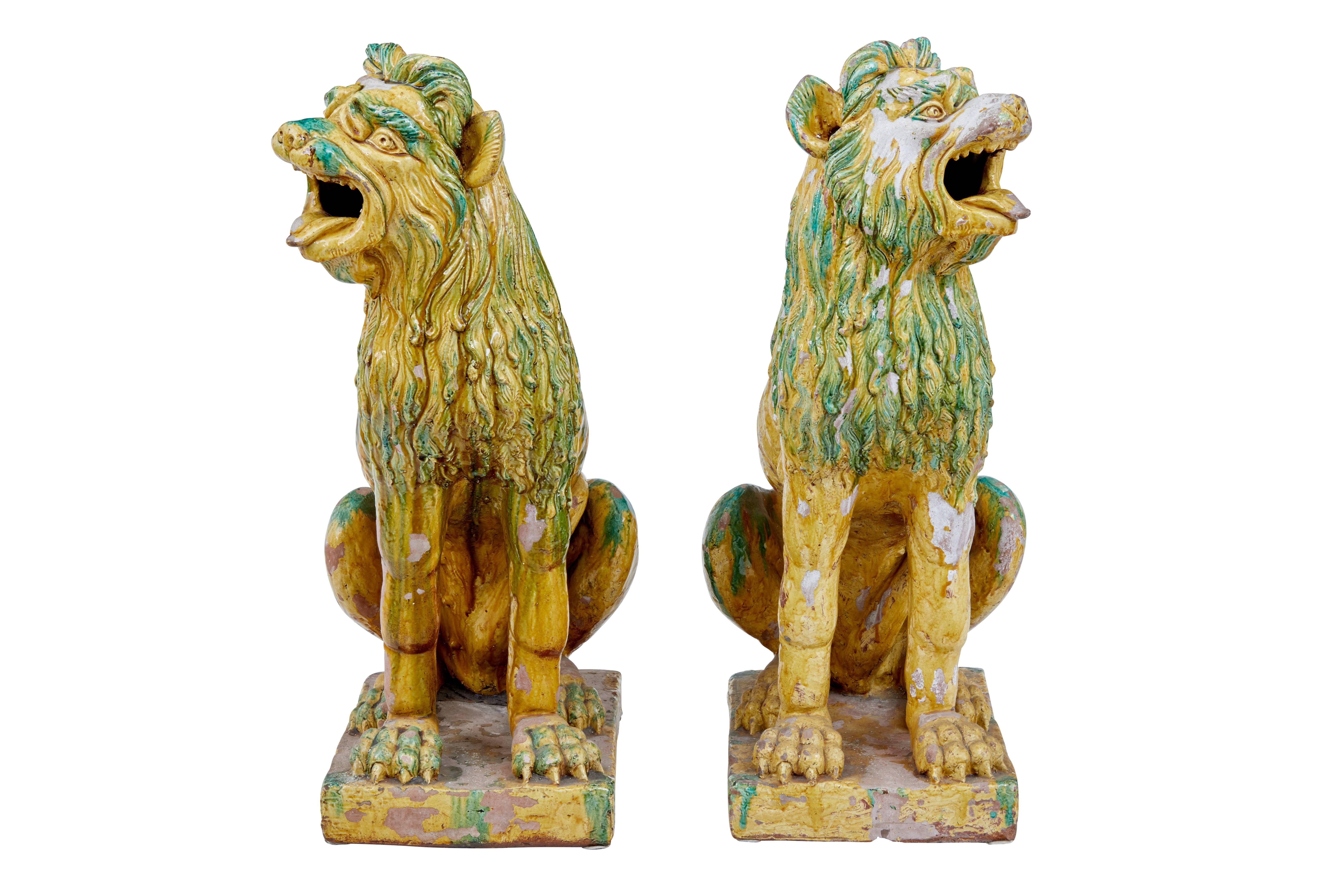 Rare pair of 20th century salt glaze dog statues.

We are putting these down as 1950 but they could be earlier.

Glazed with greens, yellows and reds. These are a pair and with a slight dimension difference it indicates that they are hand made