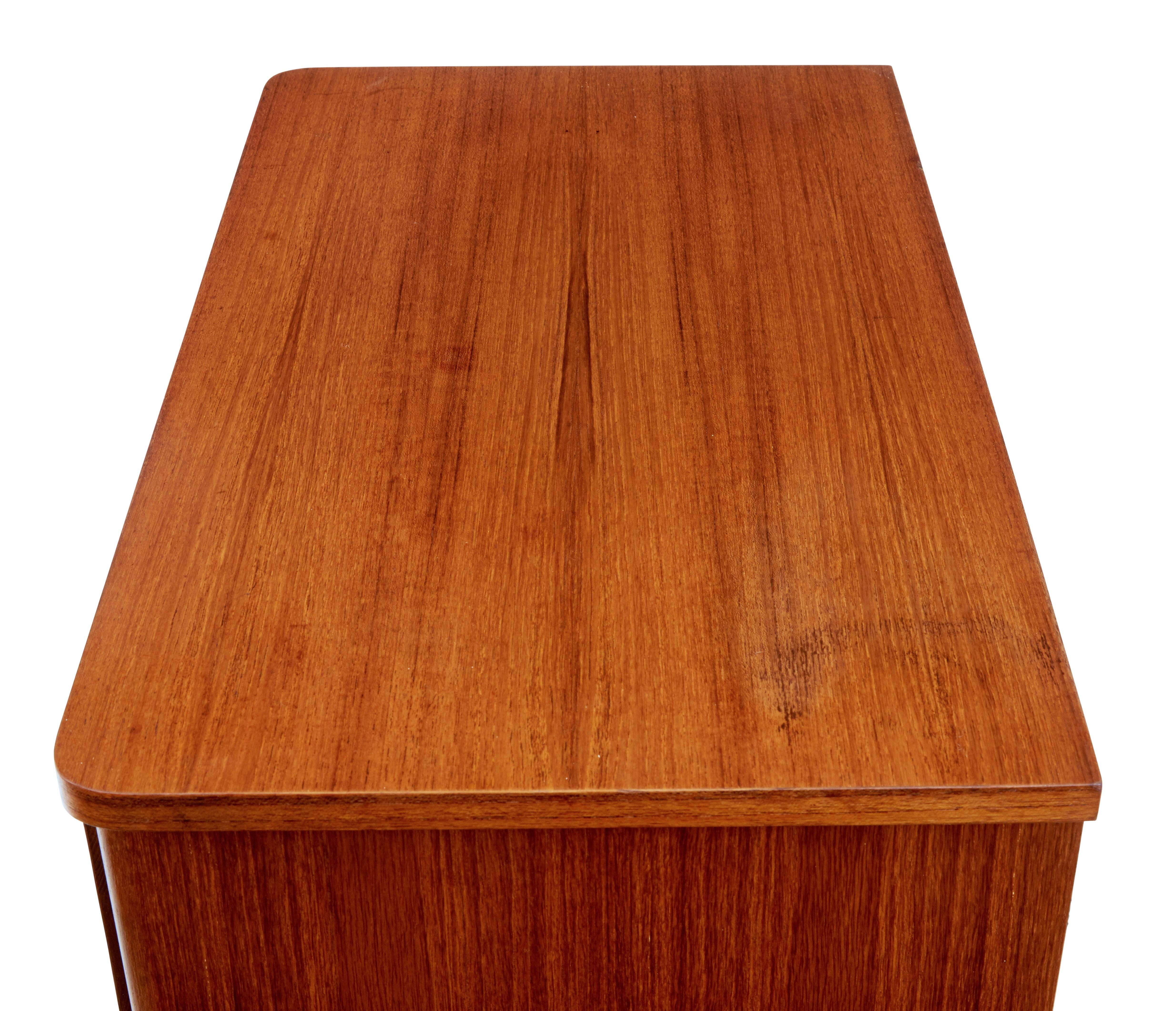 Veneer Pair of 1970's Scandinavian tall teak chest of drawers