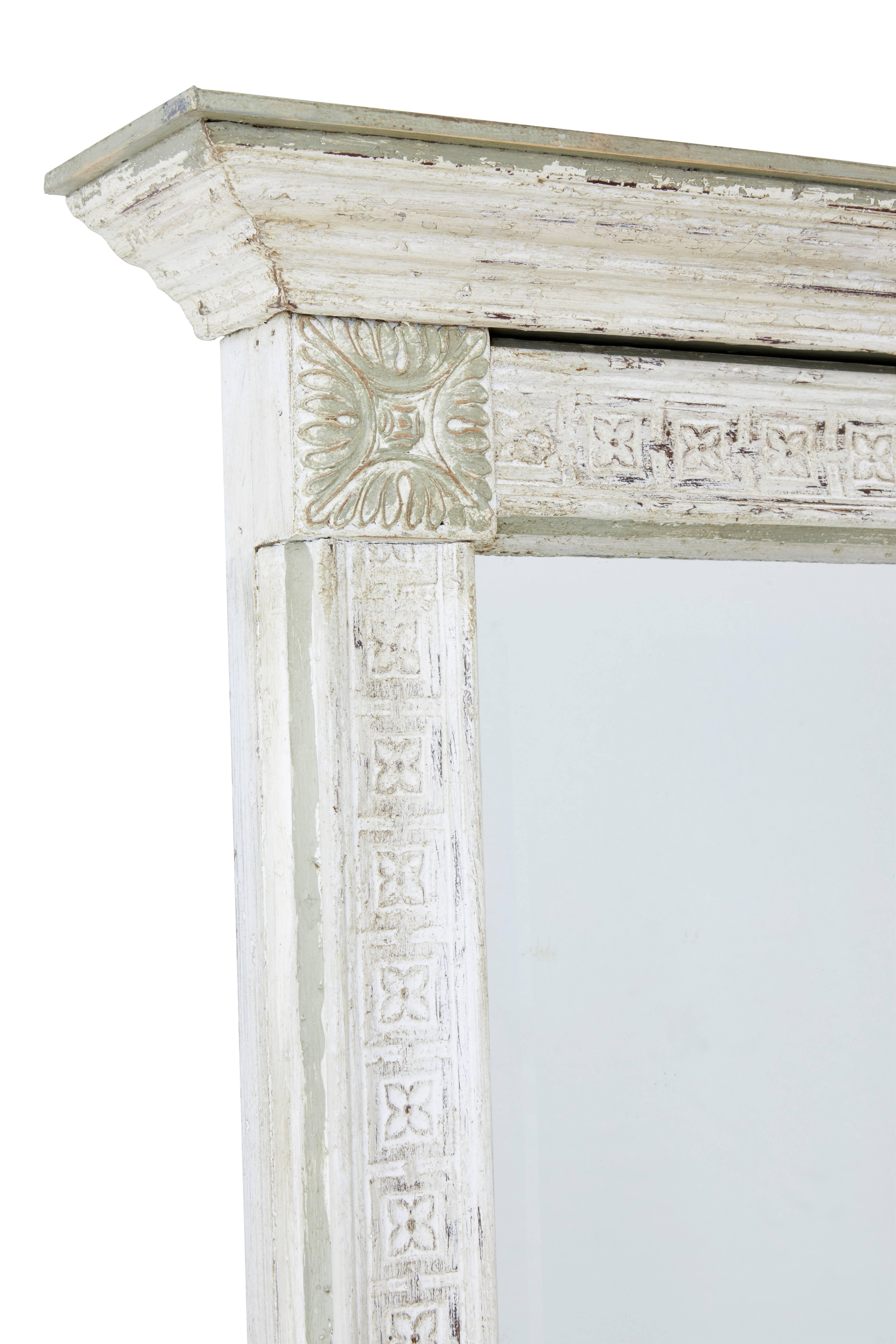 Impressive large pier / wall mirror circa 1980.

Made from 19th century mouldings, featuring carved rosettes.

Original paint which has been scraped back to reveal bare wood.

Mirror with bevelled edge
