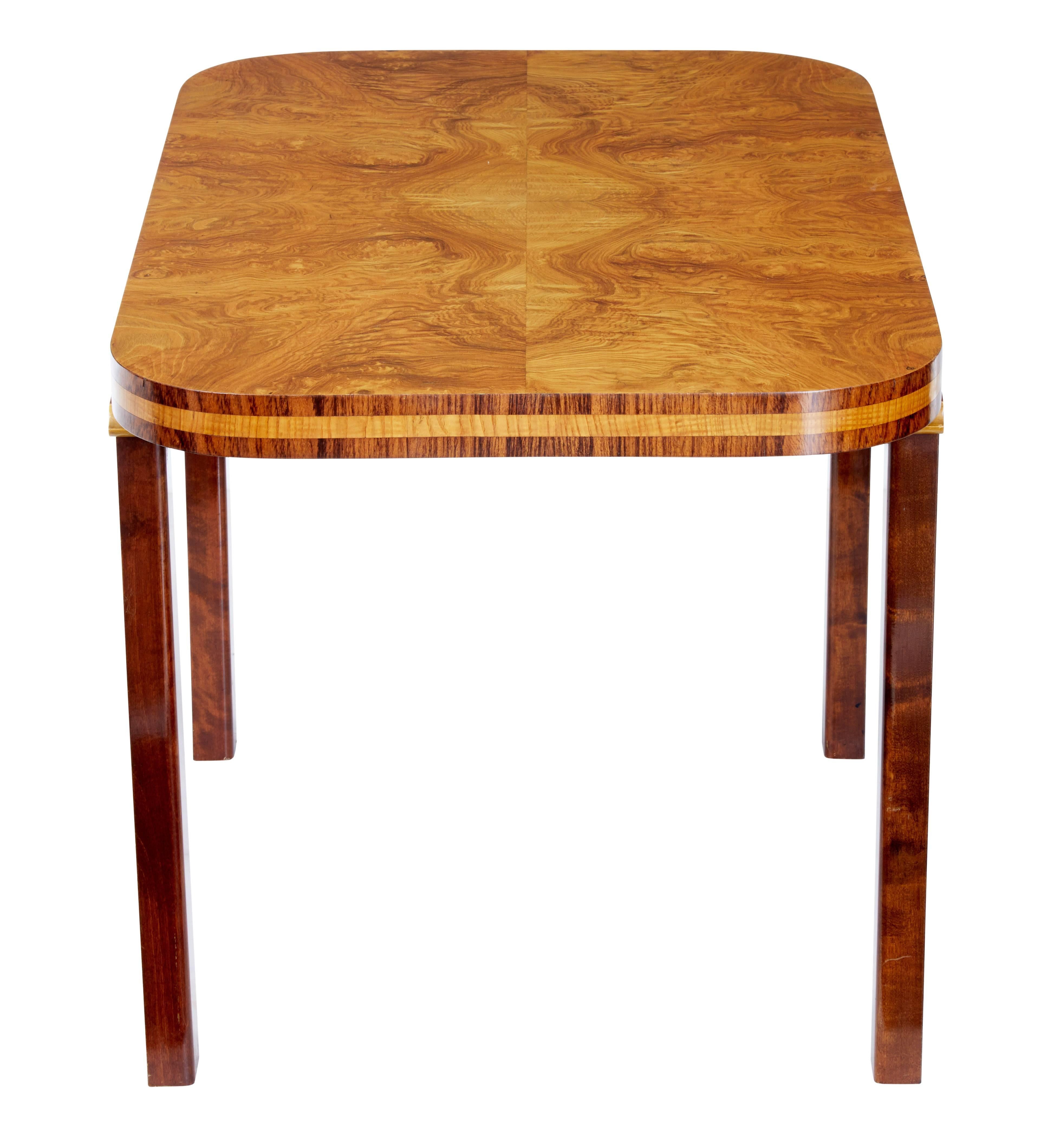 Beautiful quality Art Deco inspired coffee.

Made from fine quality elm root timber with quarter matched veneers.

Crossbanded with kingwood to the top edge and legs. Stylised column detail to the top of the legs.

Very minor surface marks to