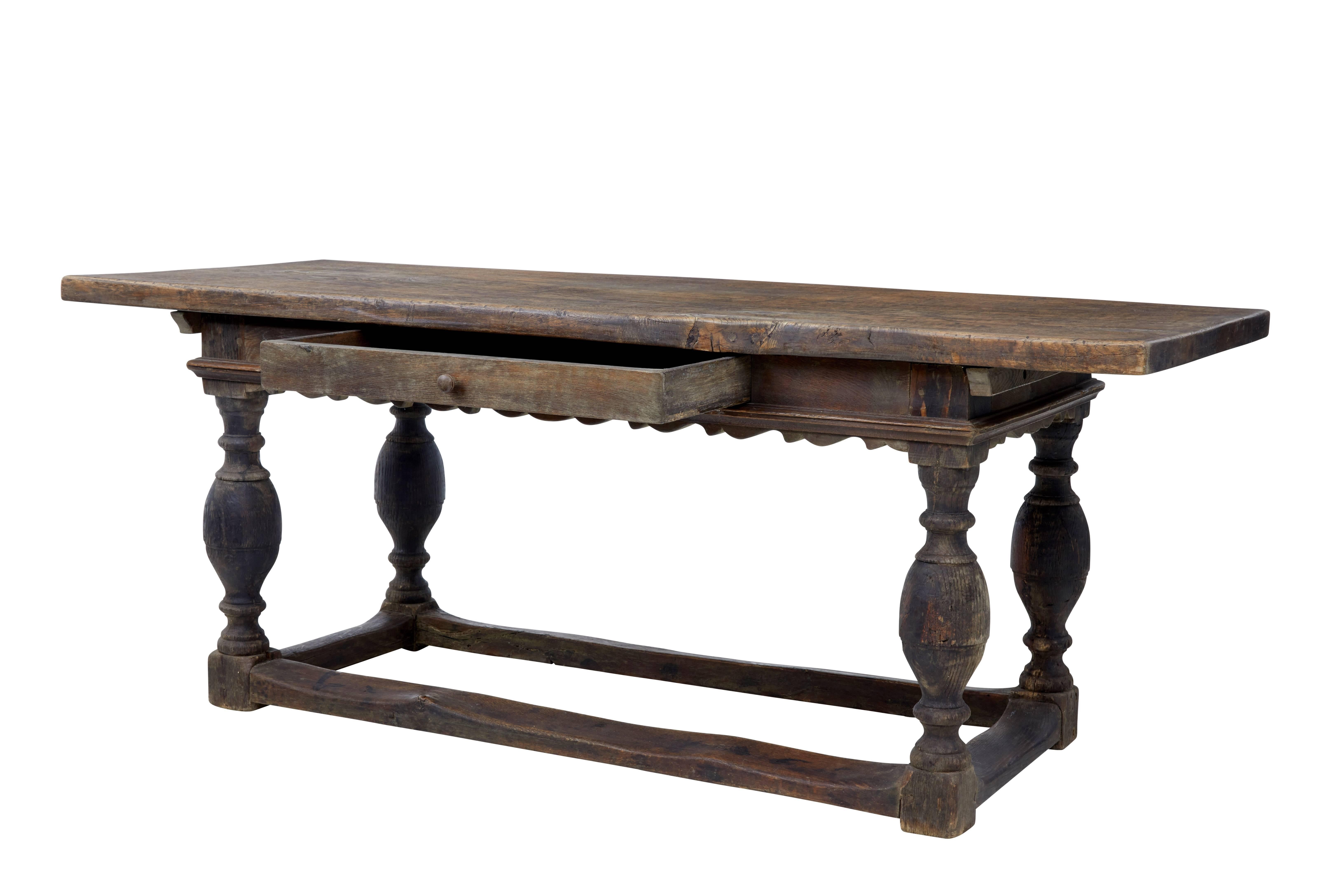 Quality Scandinavian oak table, circa 1760.

We are pleased to offer this table in untouched original condition.

Near 2 inch thick solid oak top, held in place on the base by barers and pegs.

Shaped apron above the knee with a single deep