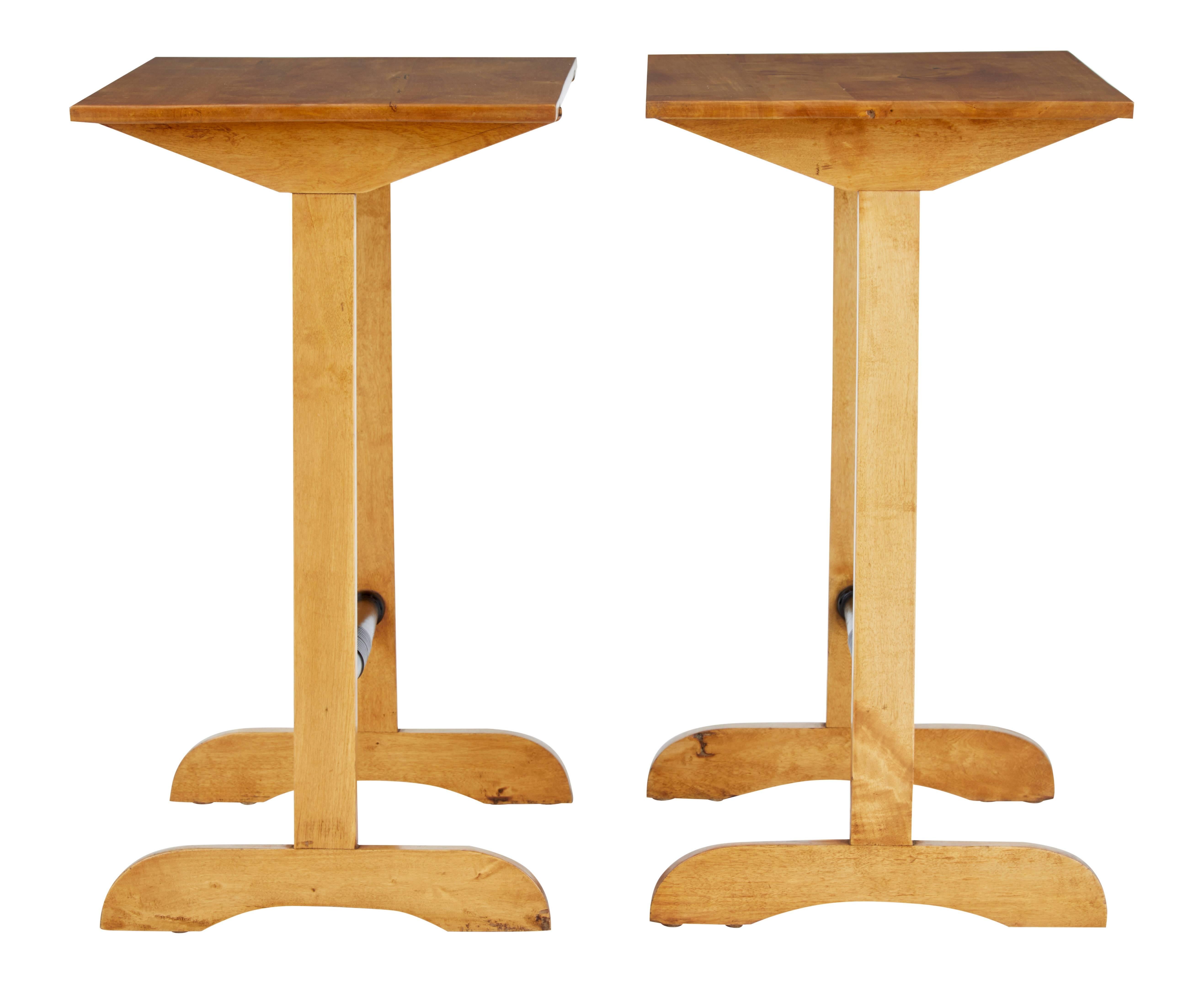 Pair of birch 1920s occasional tables.

Unusual pair of birch tables that have potential multiple uses, but we think they would work well as a pair of lamp tables. Recently restored and back to their rich birch color. Turned ebonised