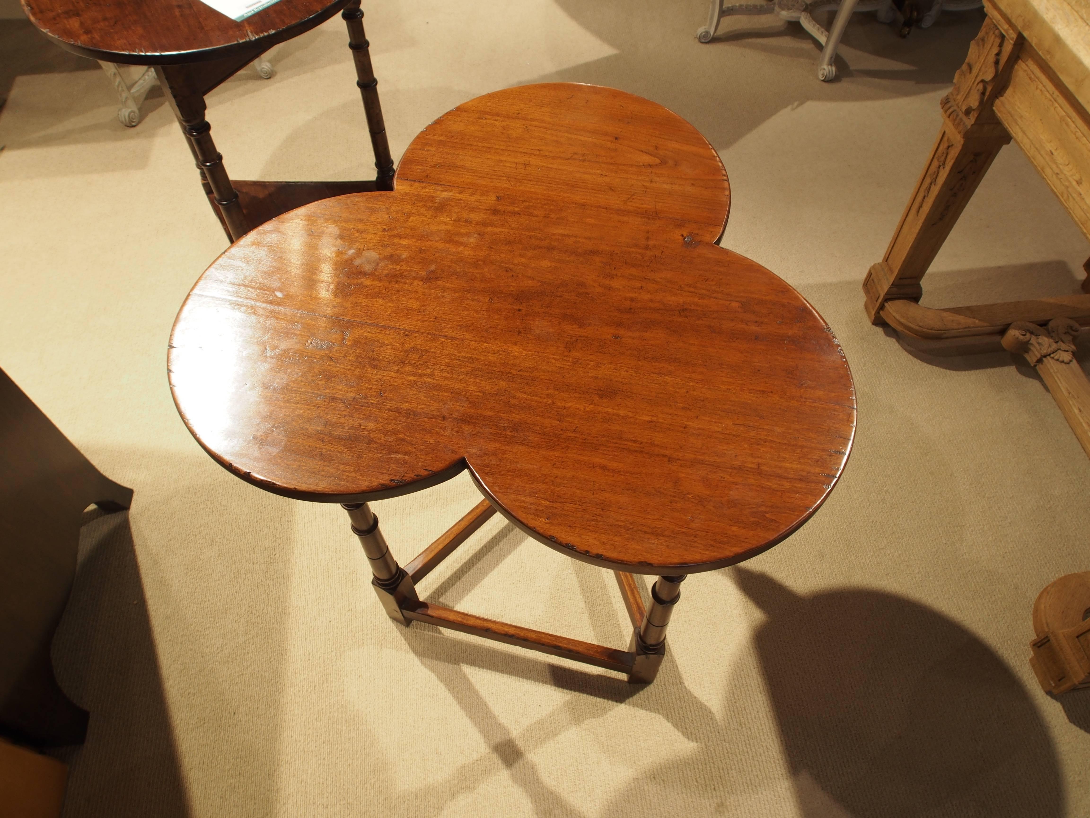 Clover leaf pub table in medium cherry.