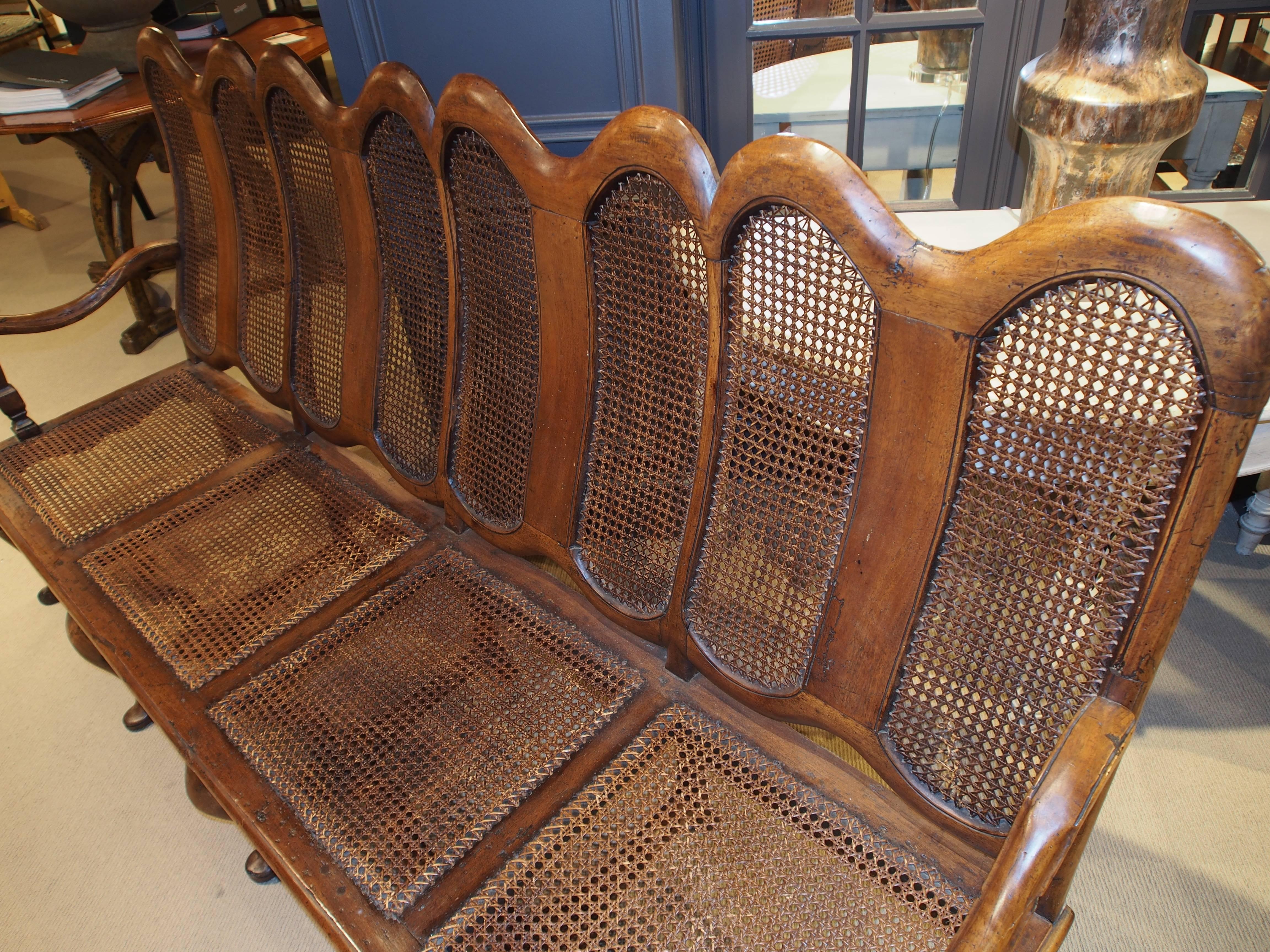 19th Century French Settee in Walnut and Cane For Sale