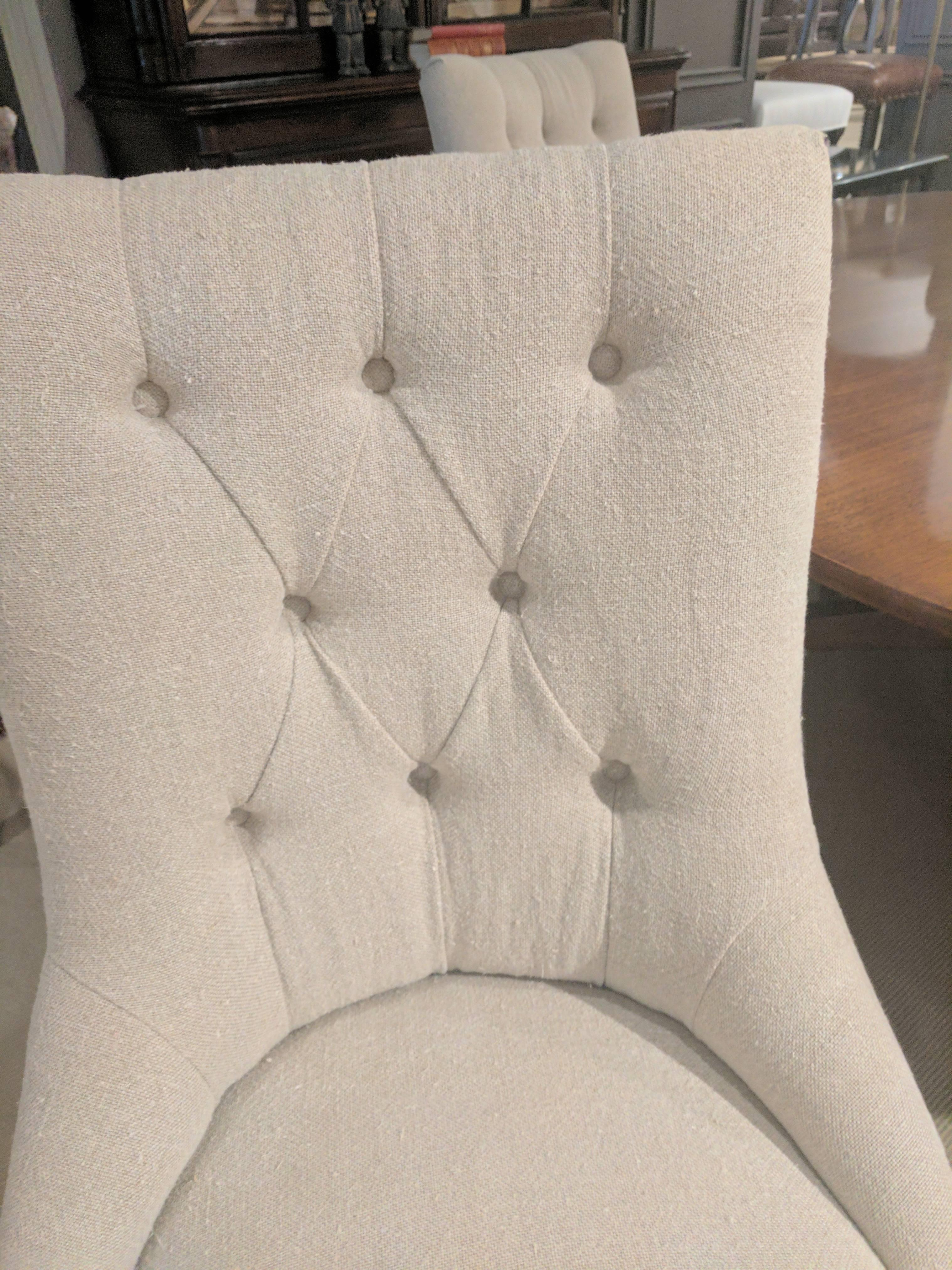 Comfortable side or dining chair with tufted back.