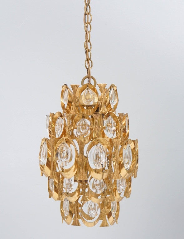 gold plated hanging prism light, chandelier or pendant by Sciolari.
i have never come across this style light before.quite rare.  i purchased it as a set with a pair of matching sconces listed separately.
original crystal ceiling cap as