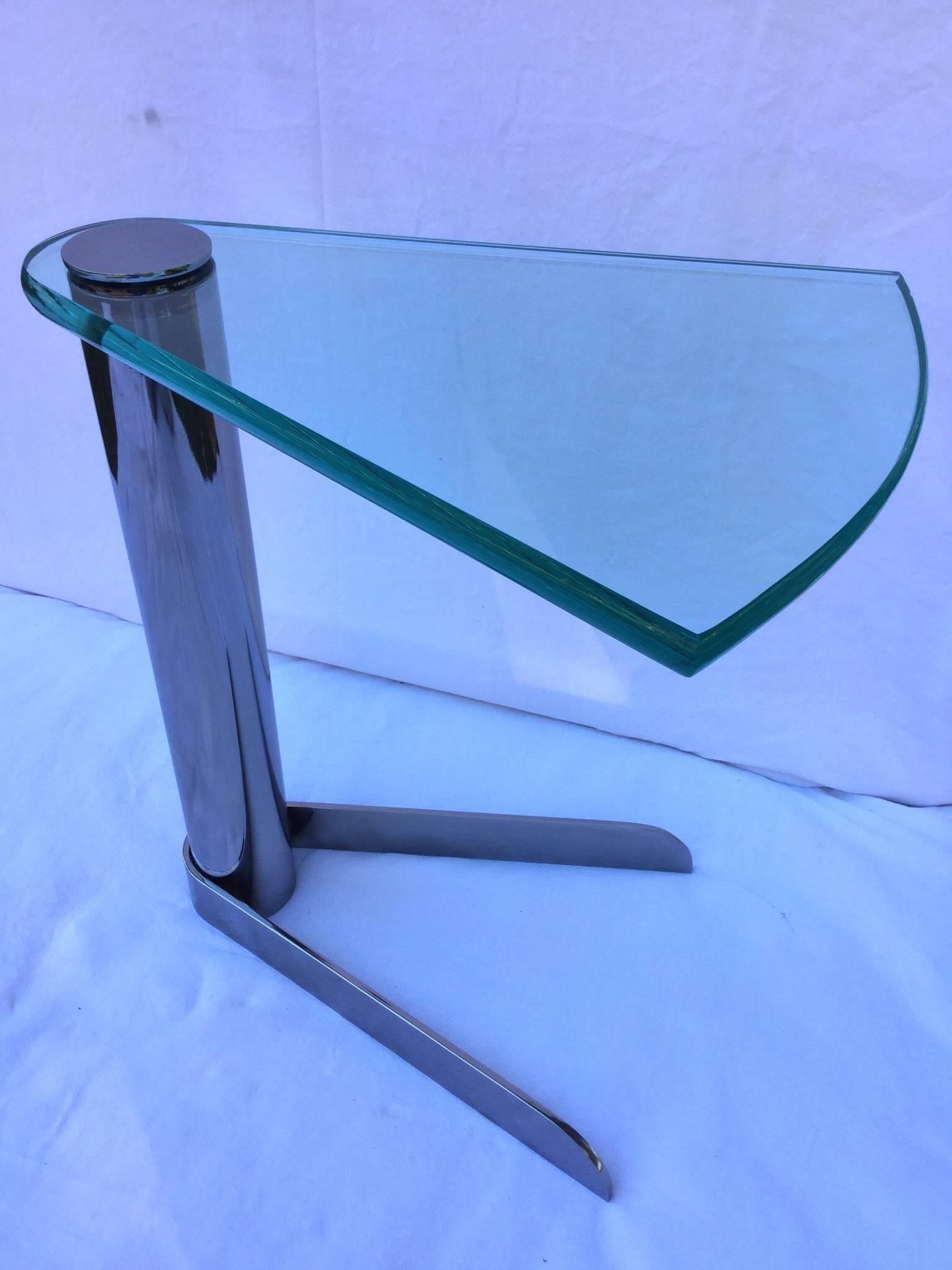 In excellent condition, this unique occasional table for use anywhere in your home. Manufactured by Design Institute of America.
Slip it next to your chair or bed.
With just a few hairline scratches to glass, it's looks like new.