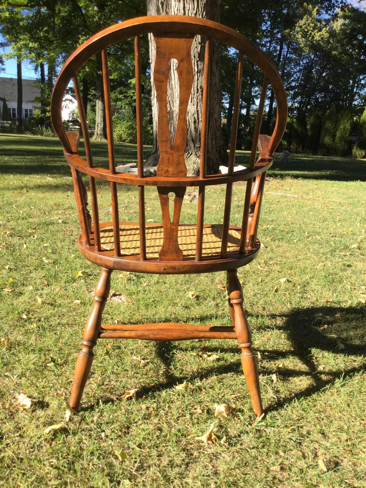Fresh from an estate in the Berkshires. A great wooden chair with a wonderful aged patina. Looks like the cane seat may have been redone at some point later. Great condition.