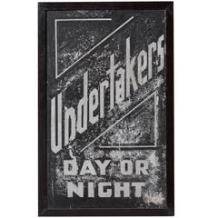 Insegna "Undertakers" dipinta a mano