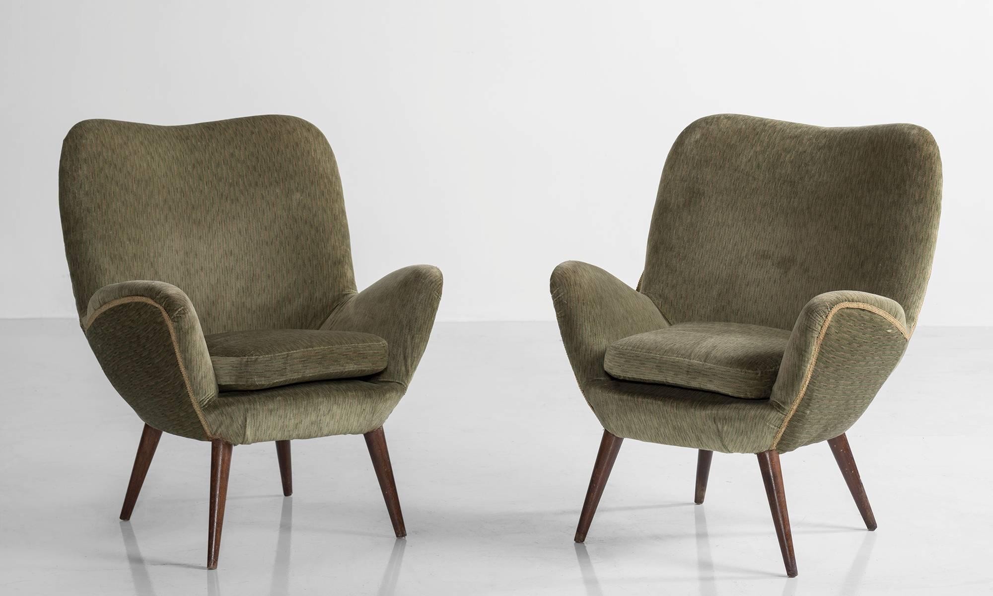 Pair of Giuseppe Carmignani armchairs with original Mohair upholstery on splayed wood peg legs.

Measures: 30" L x 29" D x 33" H x 17" seat

Made in Italy, circa 1958.