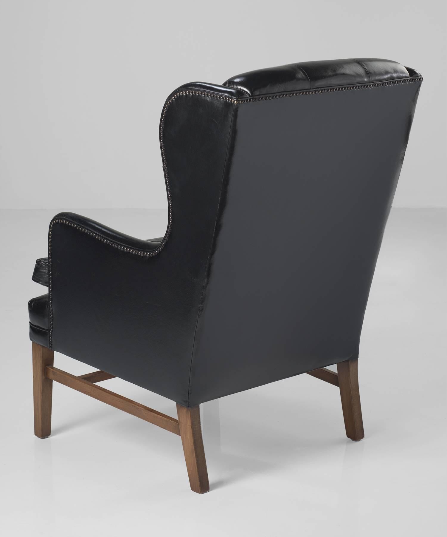Swedish Black Leather Wing Armchairs, Sweden, circa 1950