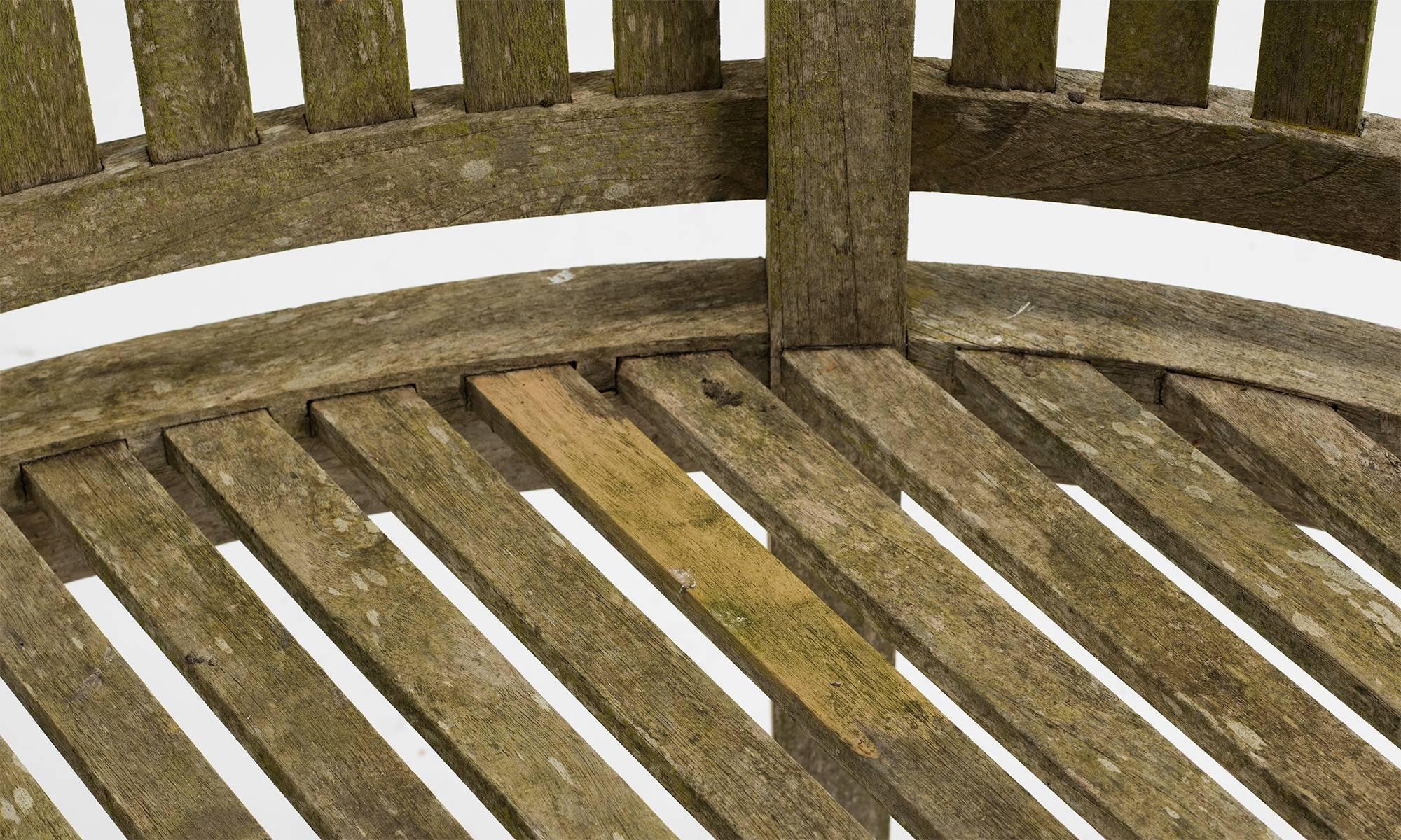 curved teak bench