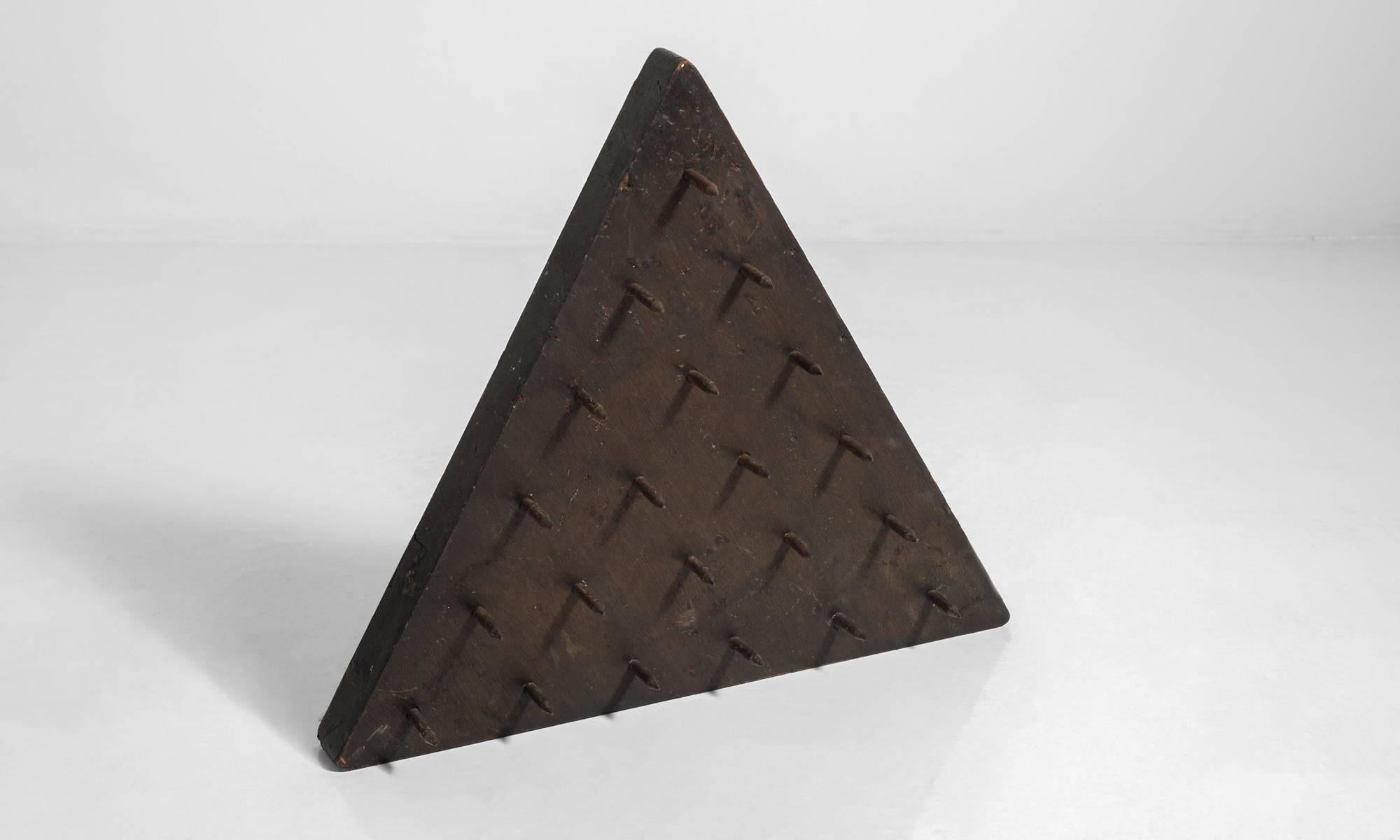 Originally from the Old Fellows Lodge. Initiates were told they would be required to sit on the spiked panel, and when blind folded, a rubber version was substituted.