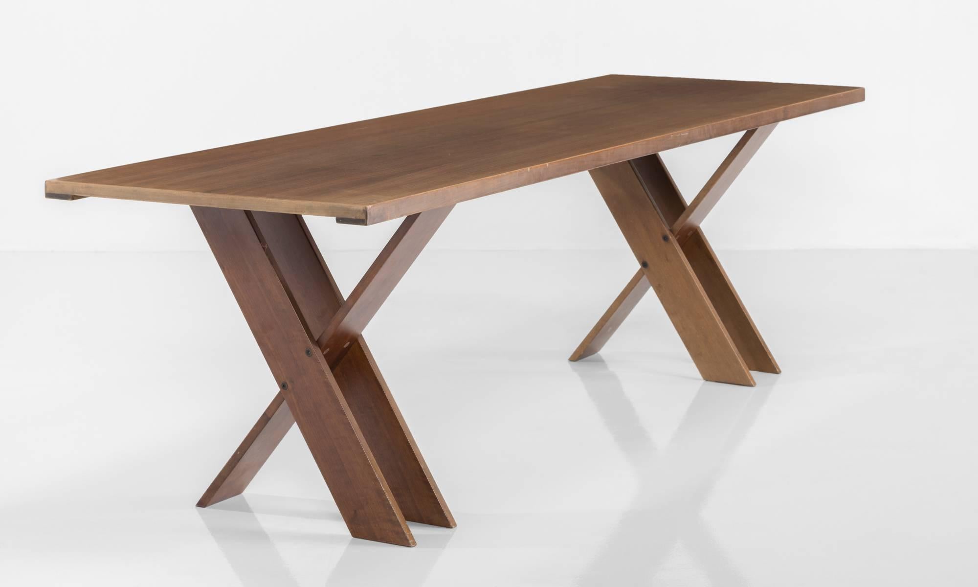 Model TL 58 dining table, designed by Marco Zanuso.

Walnut top on unique X-base, manufactured in Italy, circa 1974.