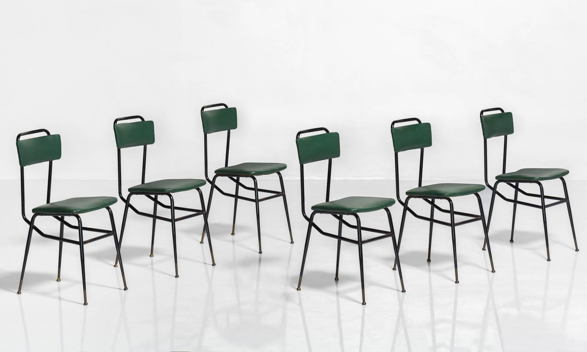 Set of six black metal and army green dining chairs, circa 1950.

Original vinyl upholstery with black metal frame.