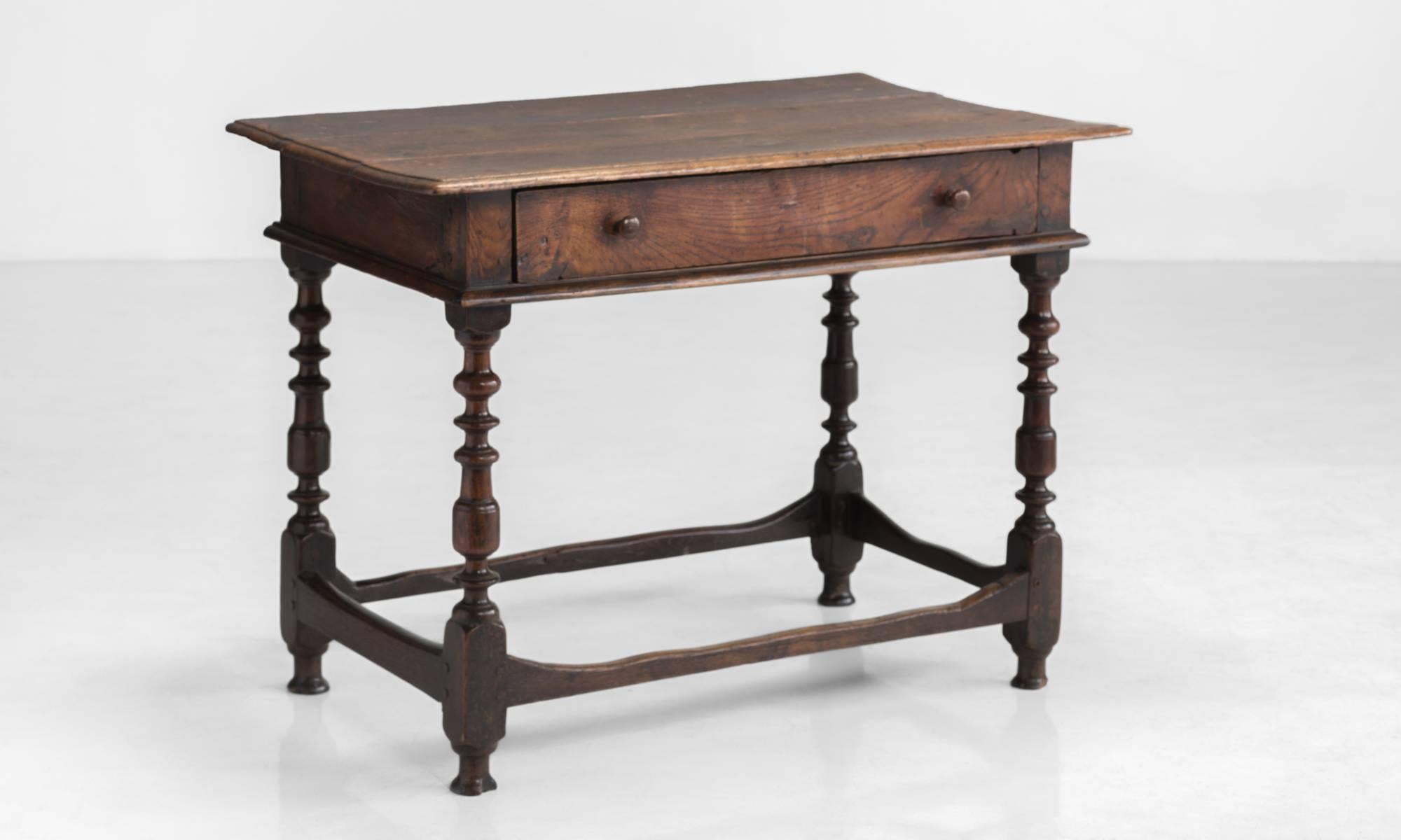 Oak side table, circa 1790.

Unique form in original finish with beautiful patina, pull out drawer and turned legs.