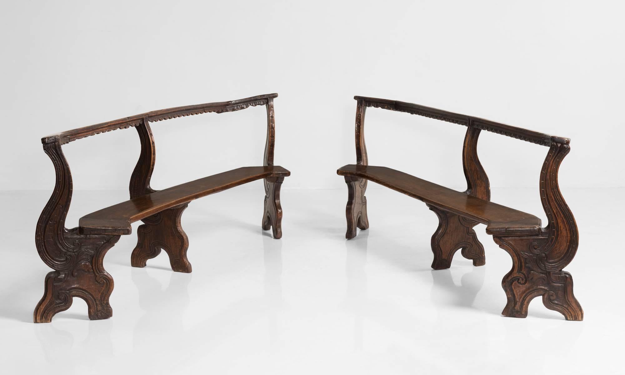 Curved Mahogany Bench, Italy, circa 1800.

Unique form with legs and back support in the shape of a horse motif.