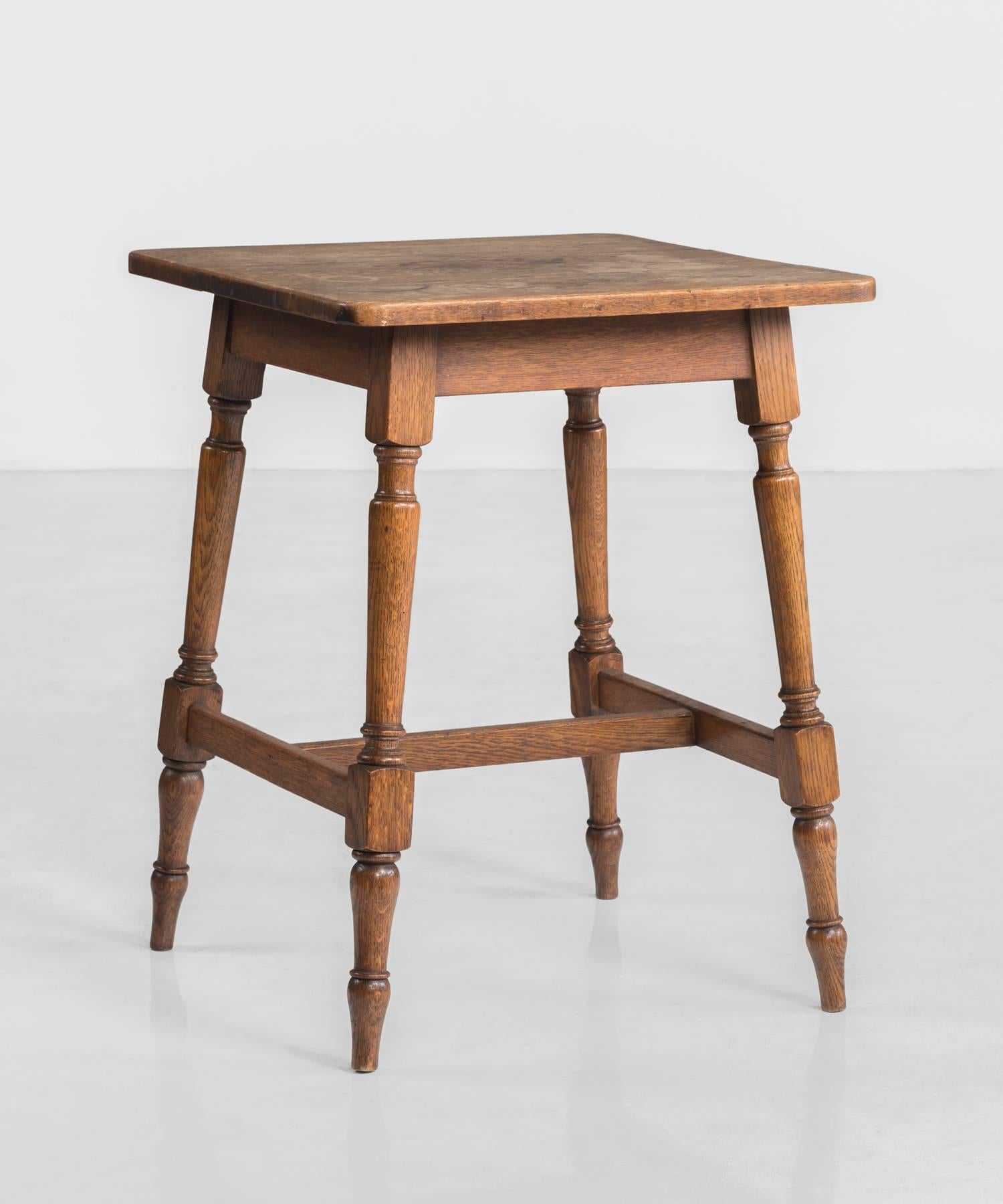 Oak Side Table, circa 1890

Beautifully patinated top with handsome turned legs.