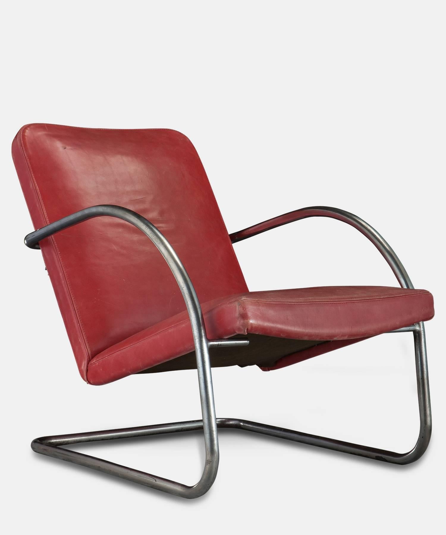Chrome and Red Leather Lounge Chair, France, circa 1950

Original leather upholstery with cantilever base.