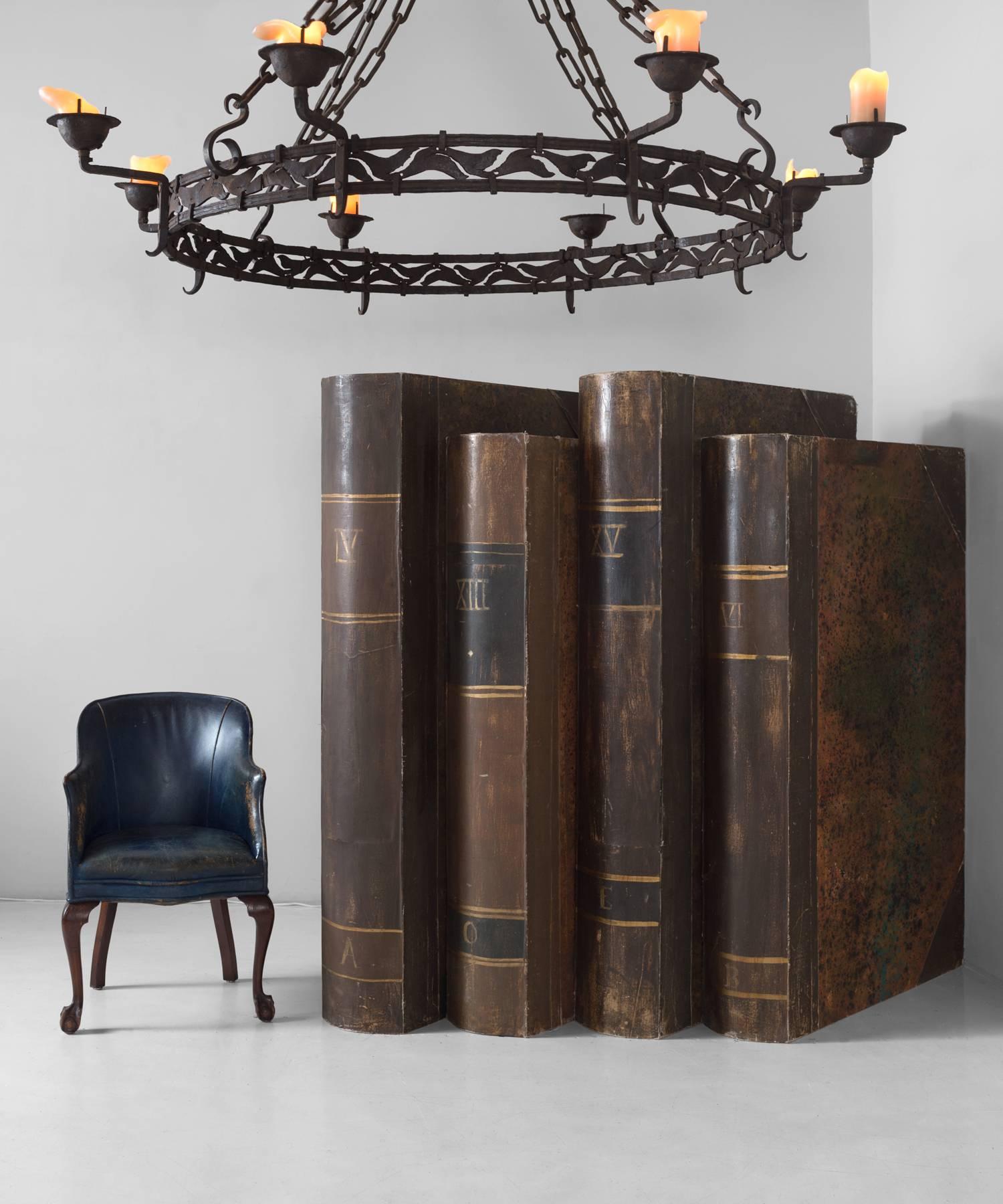 Massive prop books crafted from wood, paper, paint and canvas.