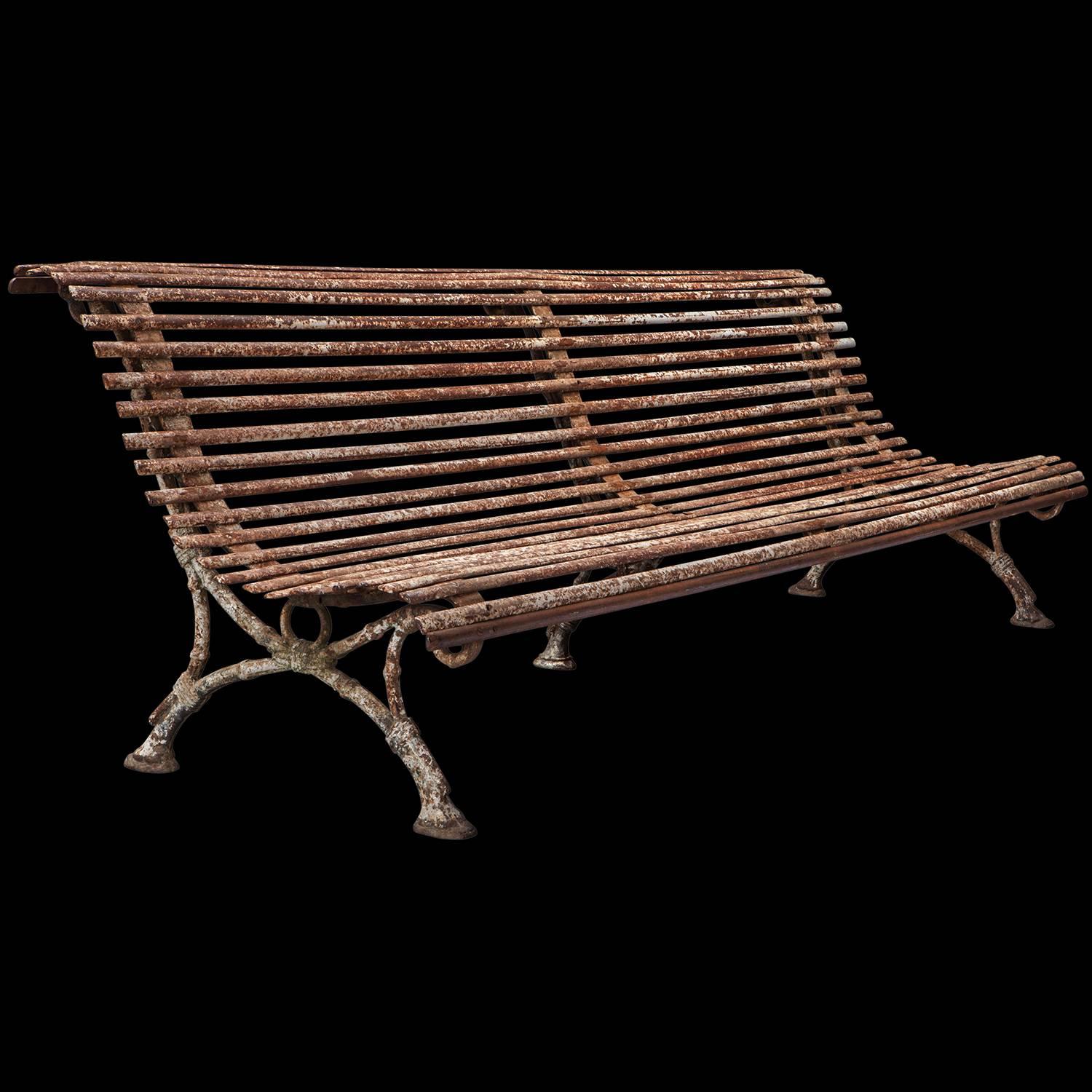 Arras’s bench with metal slats on iron hoofed feet.