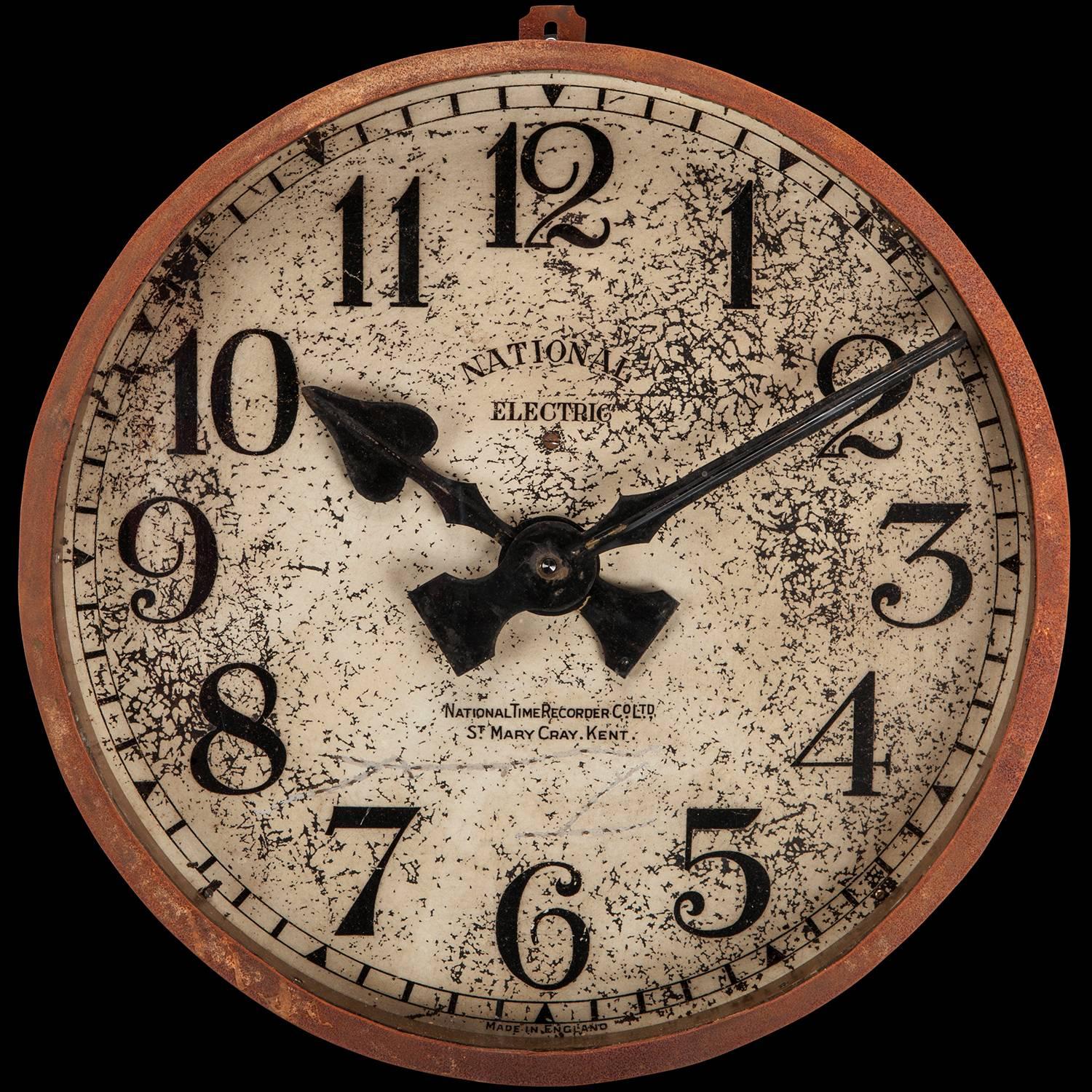 Original condition, with metal face and hand painted face. Created by National Time Recorder Co. Ltd. out of Kent. Quartz battery movement.