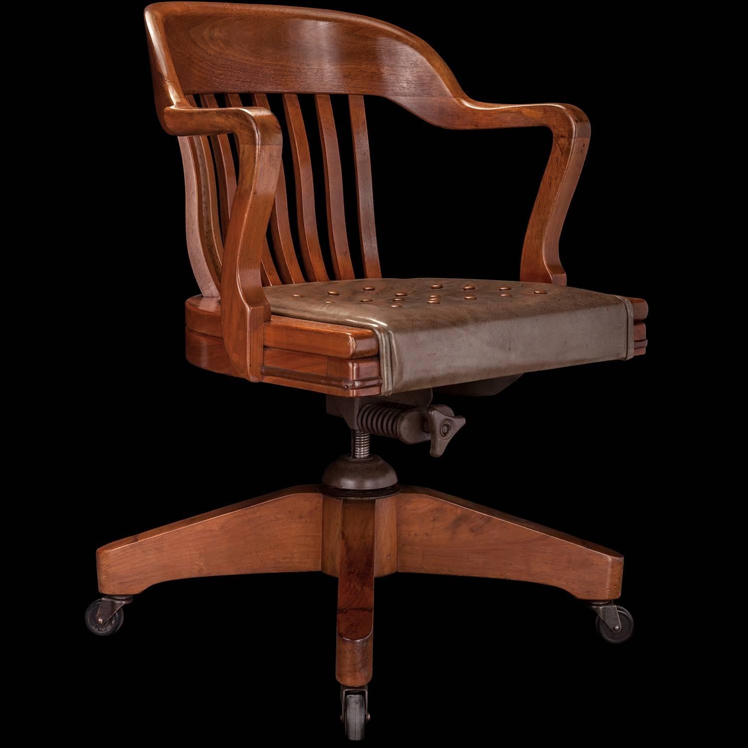 Walnut desk chair manufactured by W.H. Gunlocke Chair Co.