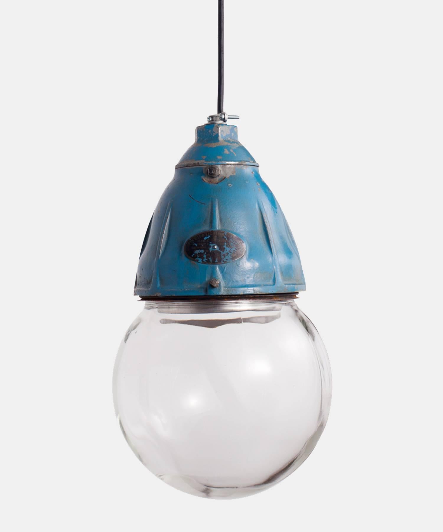 Benjamin Blue Iron and Glass Industrial Pendant, circa 1935.

Benjamin Type II-G Factory pendant with original blue paint and 8-inch Benjamin embossed glass globe.

