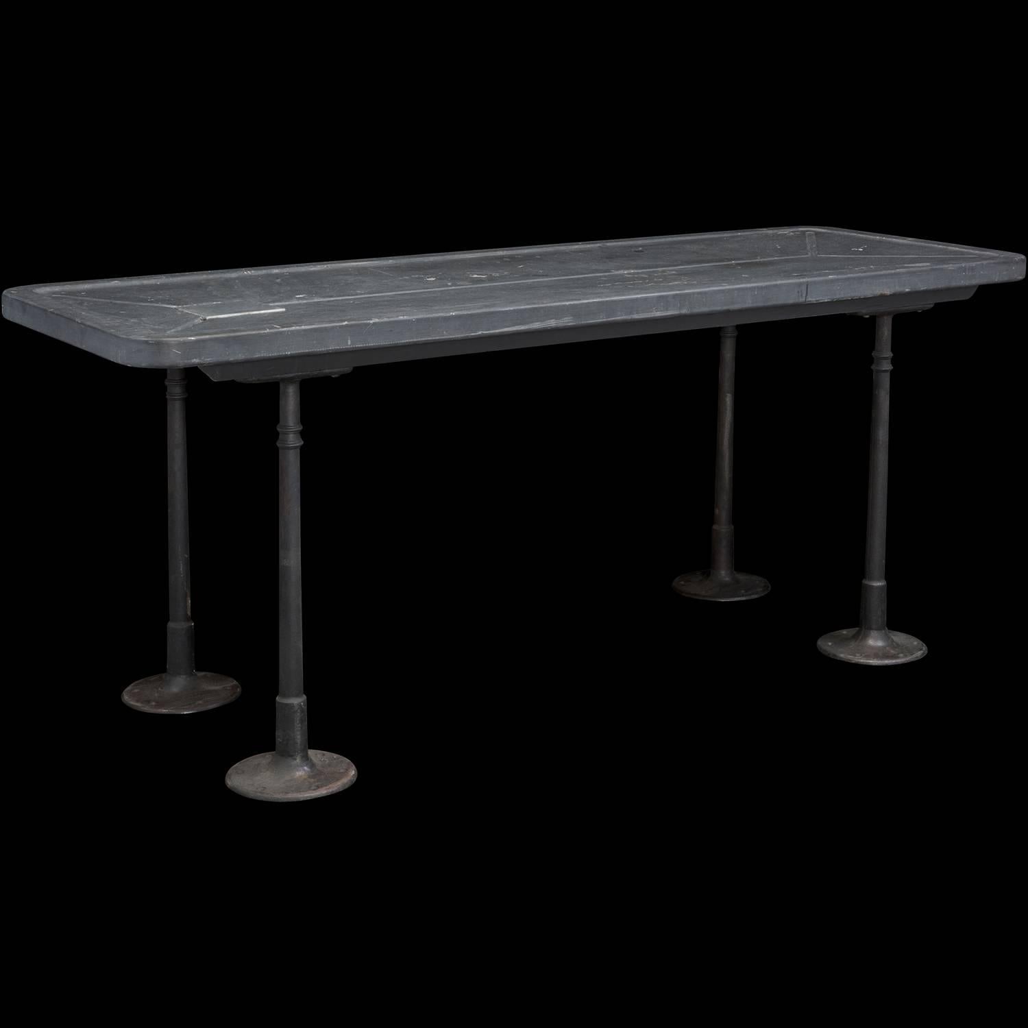 Industrial Slate Top Table, circa 1920

Cast iron legs with slate top on wood supports.