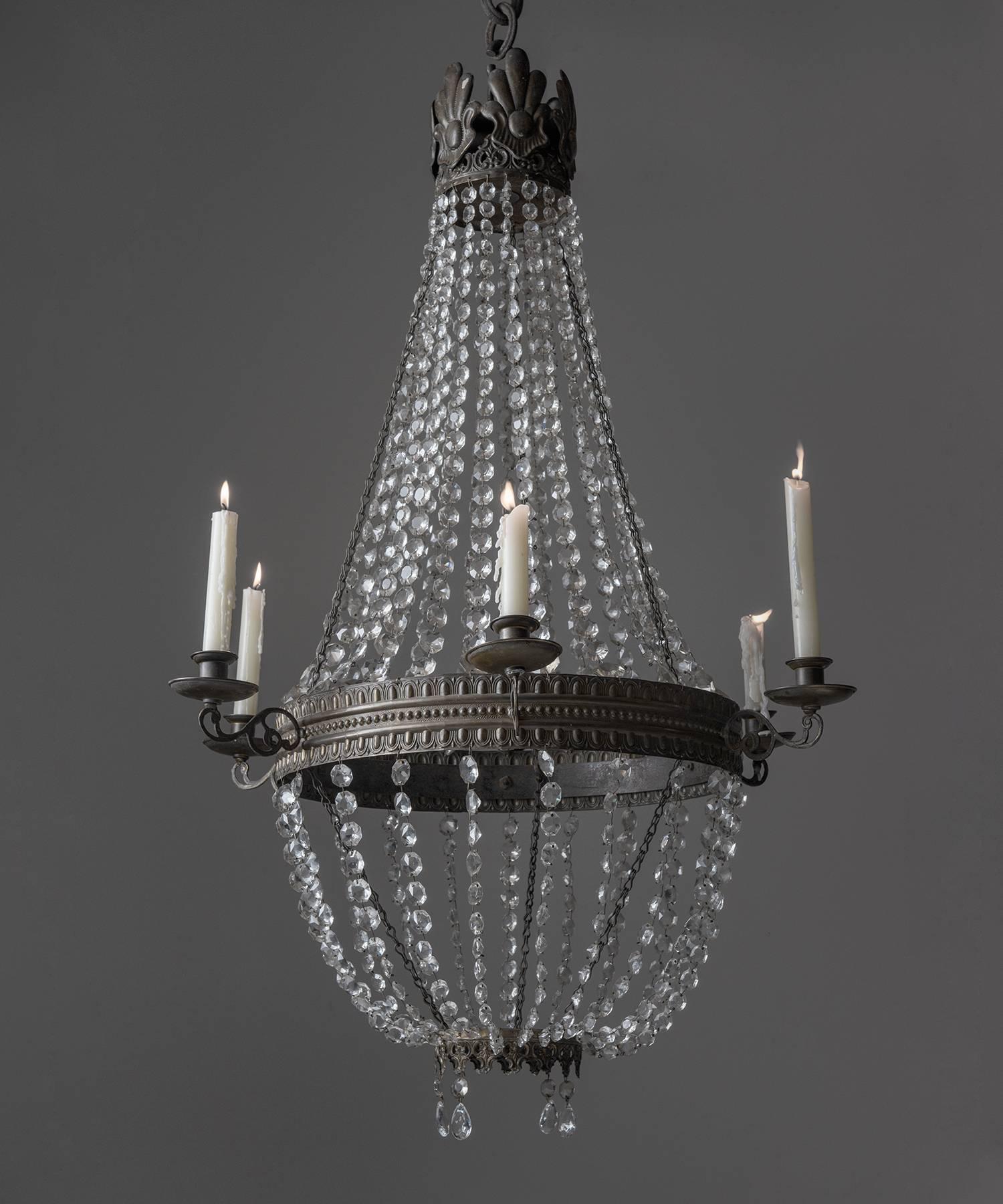 Crystal Candle Chandelier, Italy, circa 1870

Cascading crystal elements with bronze details. Holds (6) taper candles. Overall height is adjustable.