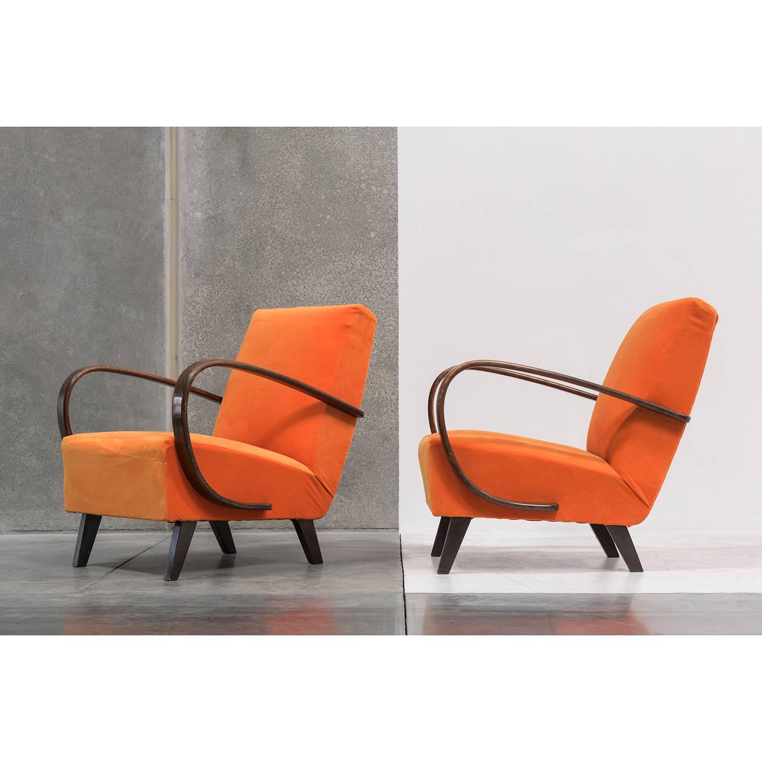 Newly reupholstered in orange velvet with bentwood arms. Manufactured by Spojene UP Zavody.