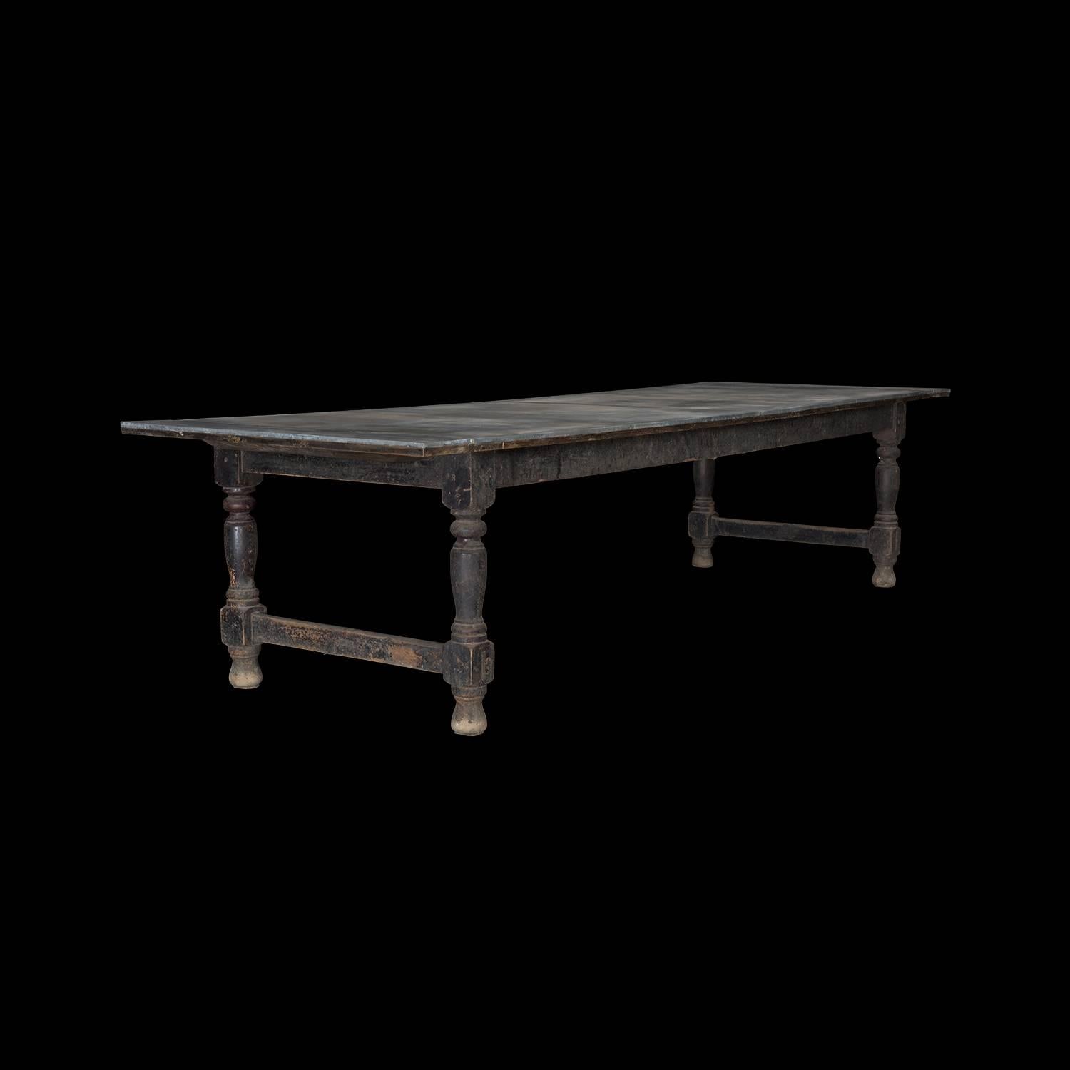 Large dining table with original painted finished and later weathered zinc top.