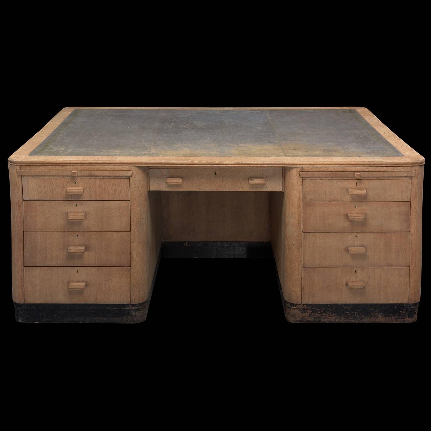 English Waring & Gillows Oak and Leather Partner's Desk, circa 1920