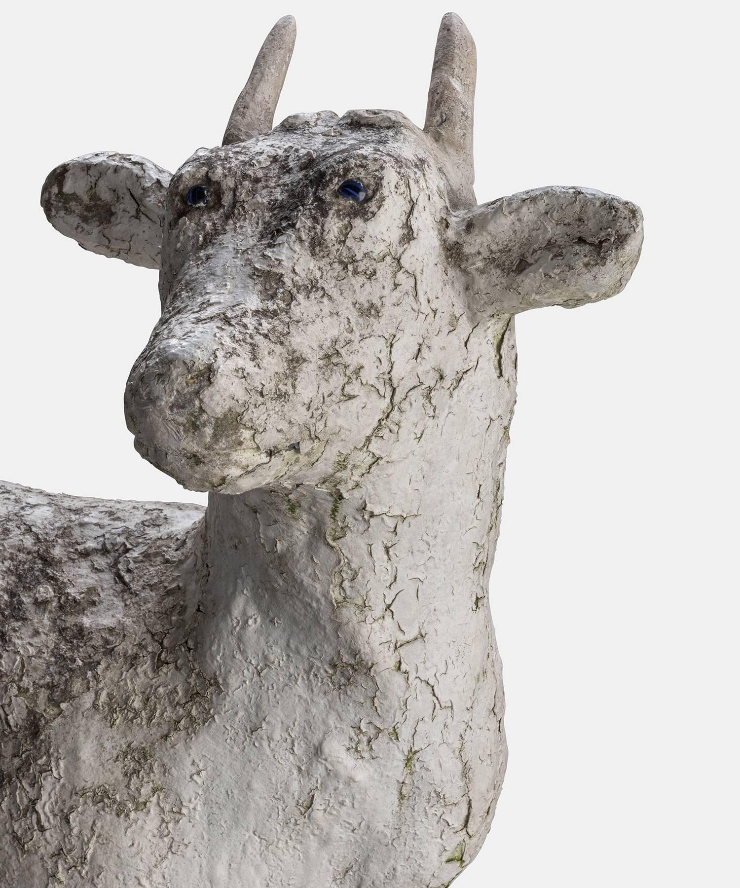 concrete goat statue