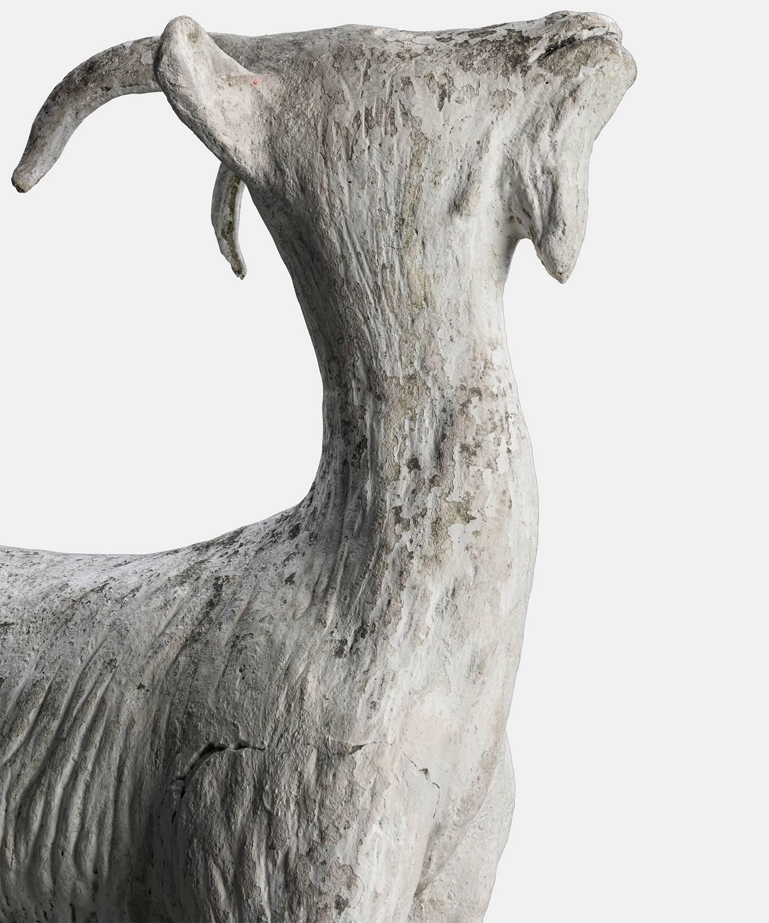 concrete goat statue