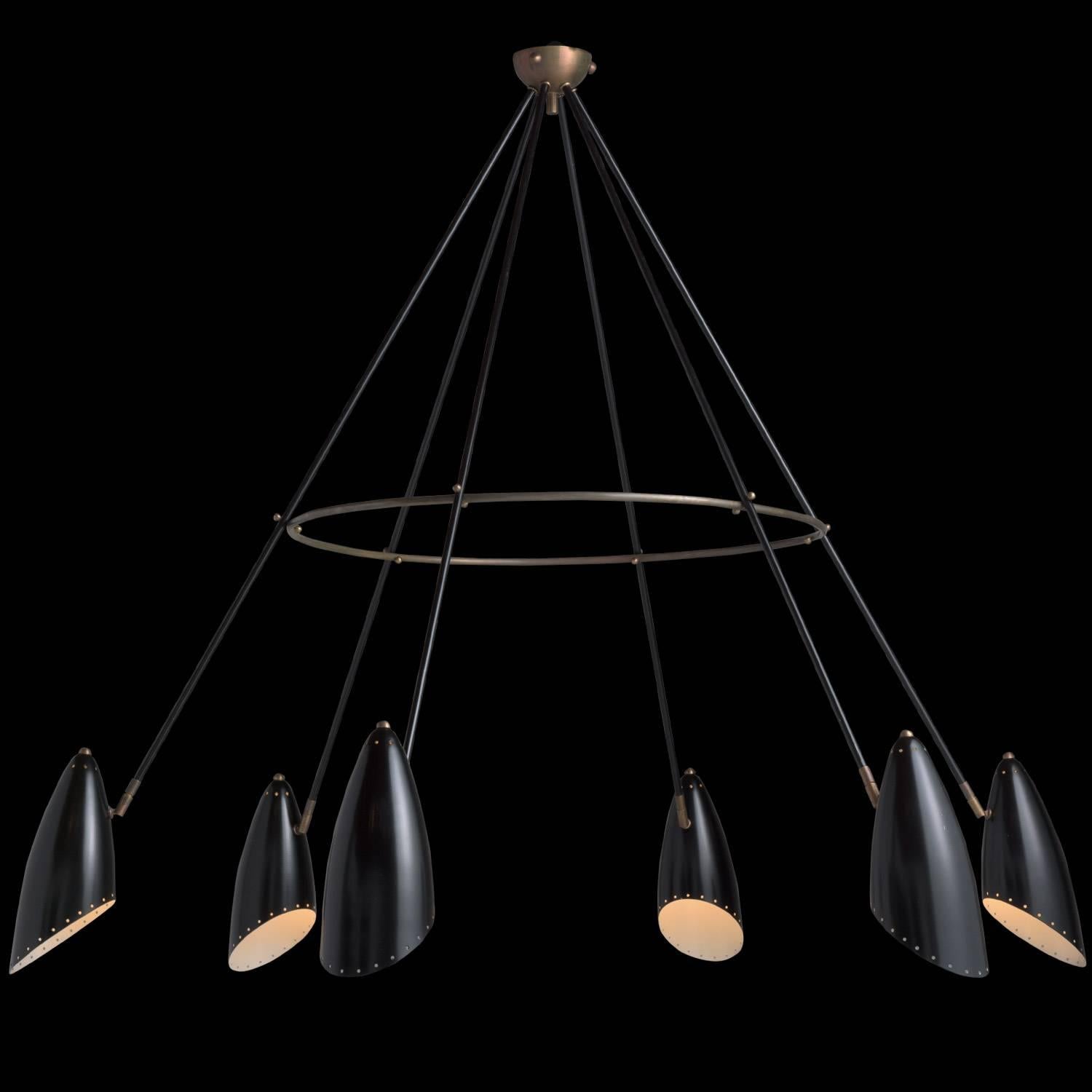 Black metal and brass modern chandelier, circa 1960.

Six-arm chandelier with pivoting shades and brass details.