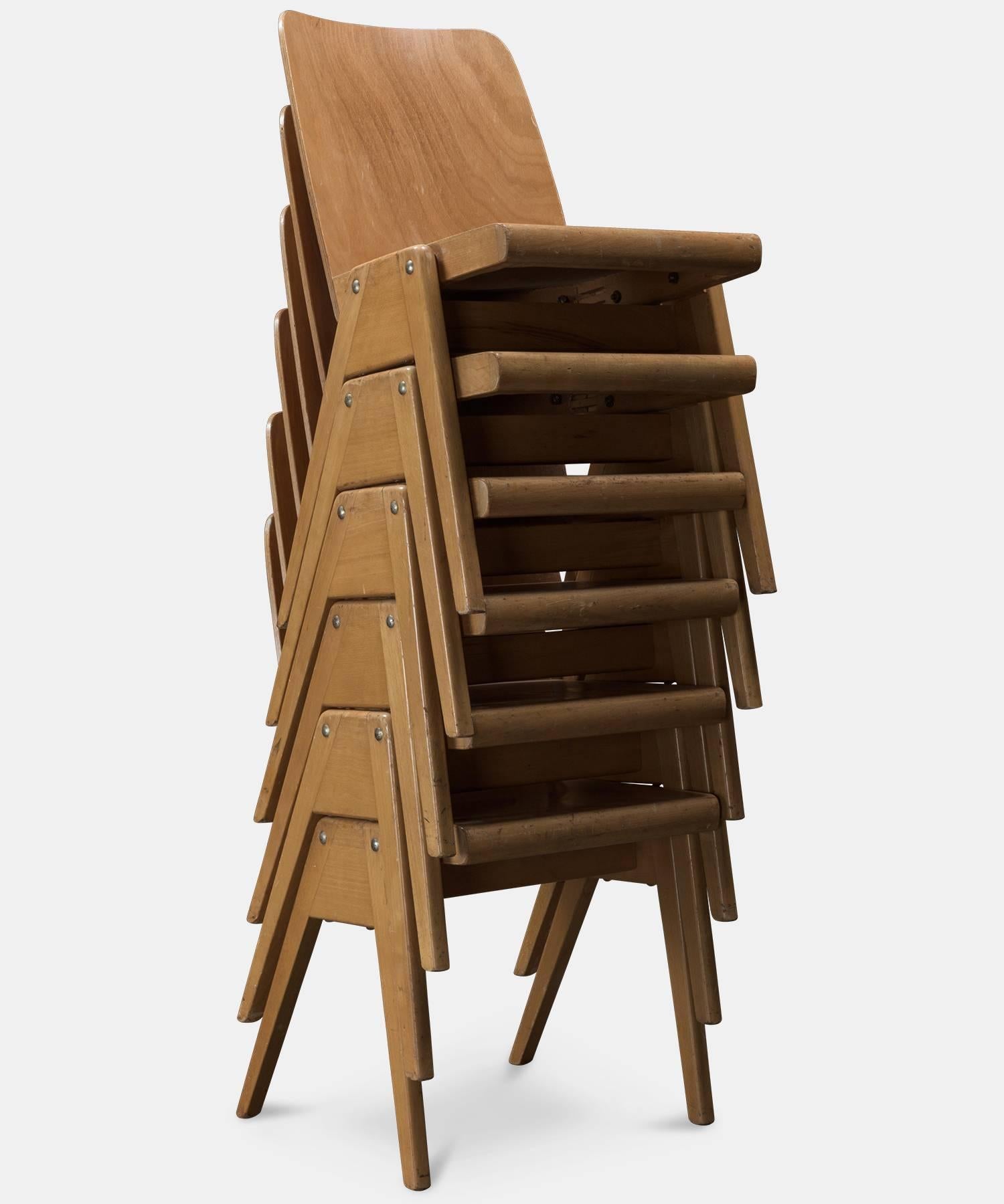 stacking wooden chairs