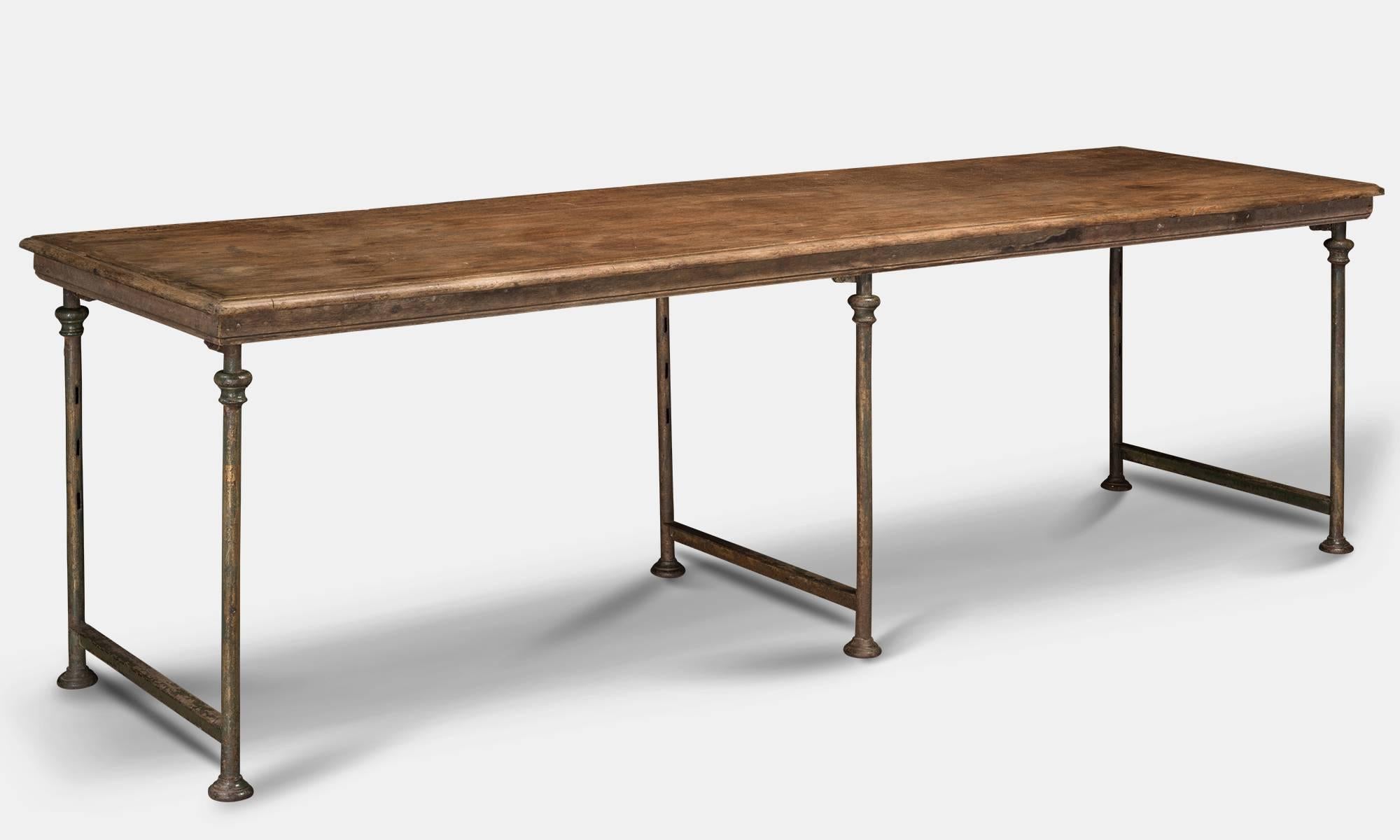 Theodore Scherf oak or iron table.

France, circa 1880.

Painted iron legs with oak tops. Manufactured by Th Scherf 49 rue Lauriston - Paris.

Measures: 103" L x 29" D x 30" H.