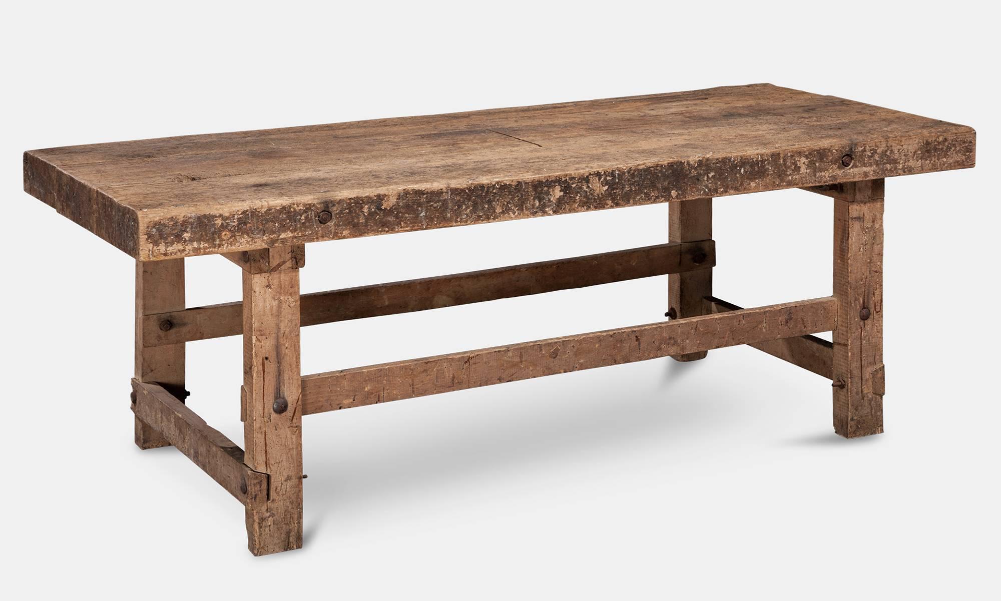 Primitive work table,

Sweden, circa 1790.

Thick slab top on sturdy base.

Measures: 81" L x 33.5" D x 30.5" H.