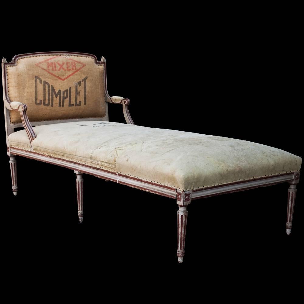 Monumental Chaise Lounge, France, circa 1860

Original painted frame with six legs and upholstered in burlap and found textiles.