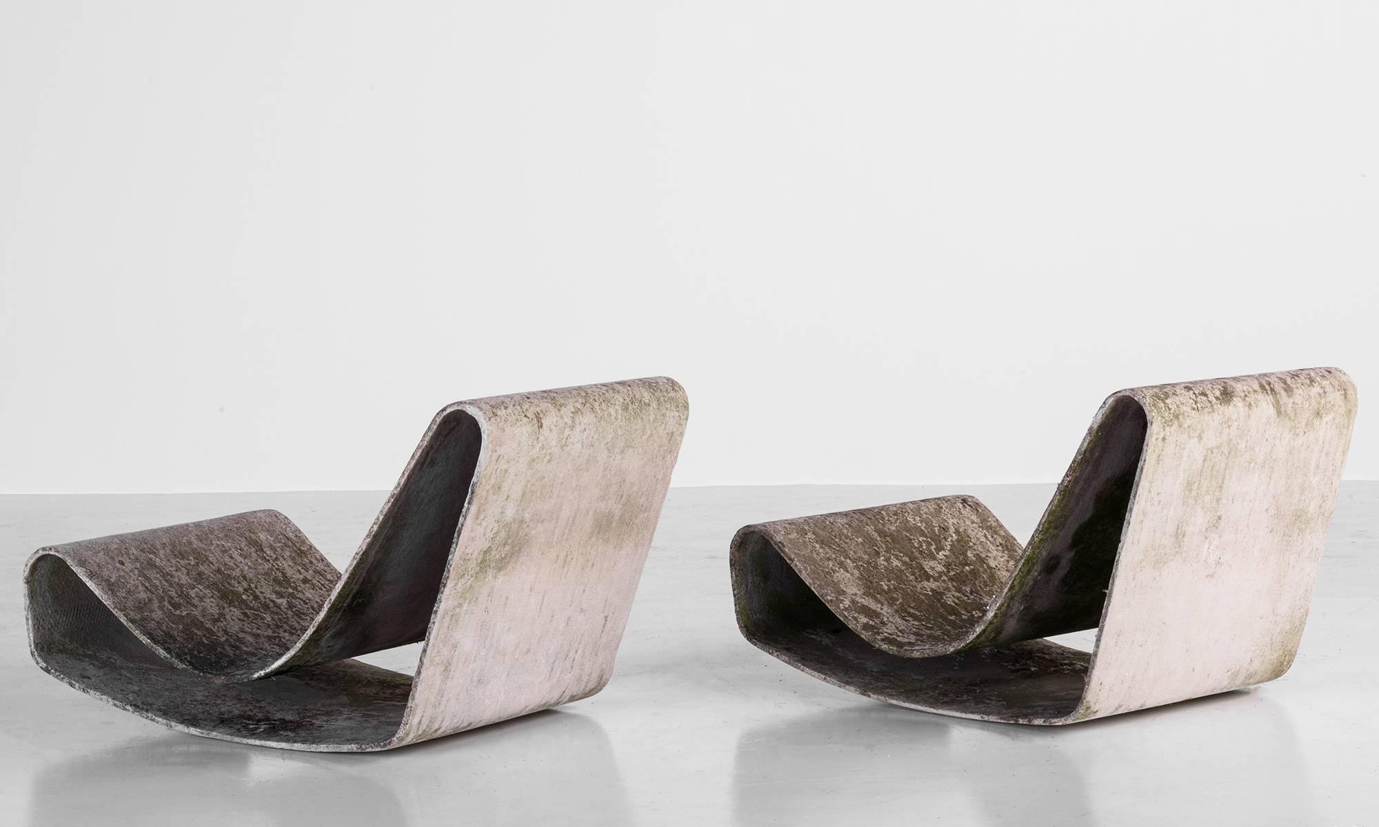 Pair of Willy Guhl Loop chairs, circa 1950.

Composed of single band fiber-reinforced cement and designed for Eternity, AG.   