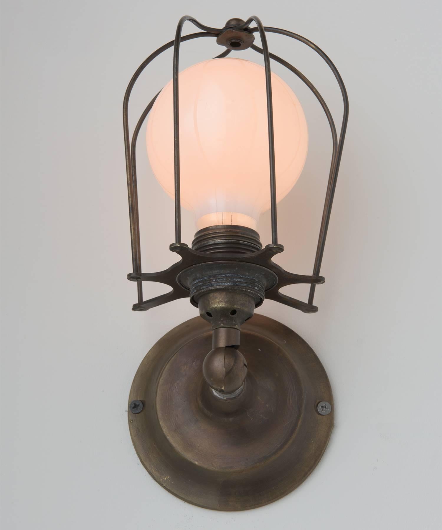 Industrial Brass Caged Wall Sconce, Made in Italy For Sale