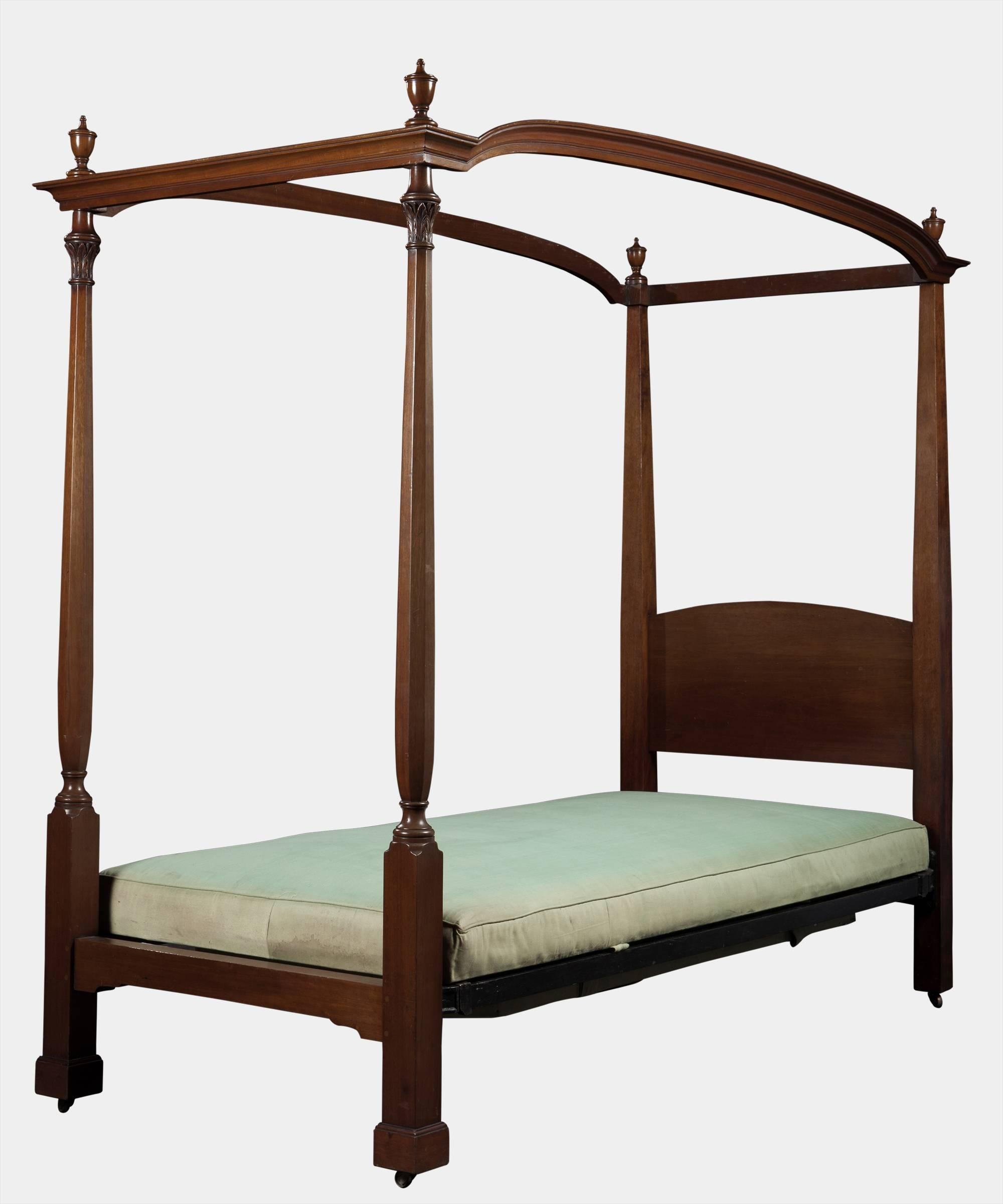 Original divan base, with turned column bed ends. Made by Heals of London.