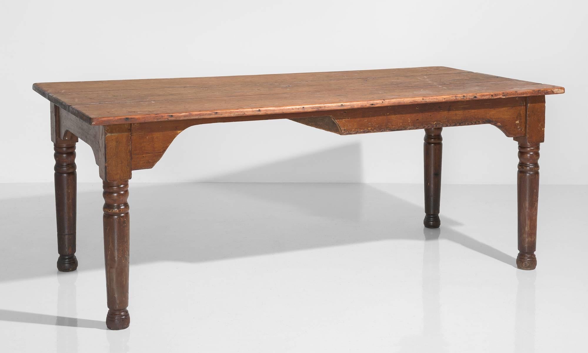 Pine Desk, circa 1900

Wonderfully patinated pine table top with turned legs.