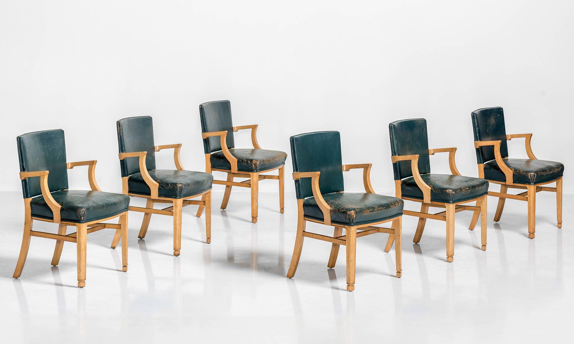 Set of six leather and maple wood dining chairs, circa 1940

Original blue or green leather upholstery on maple legs.