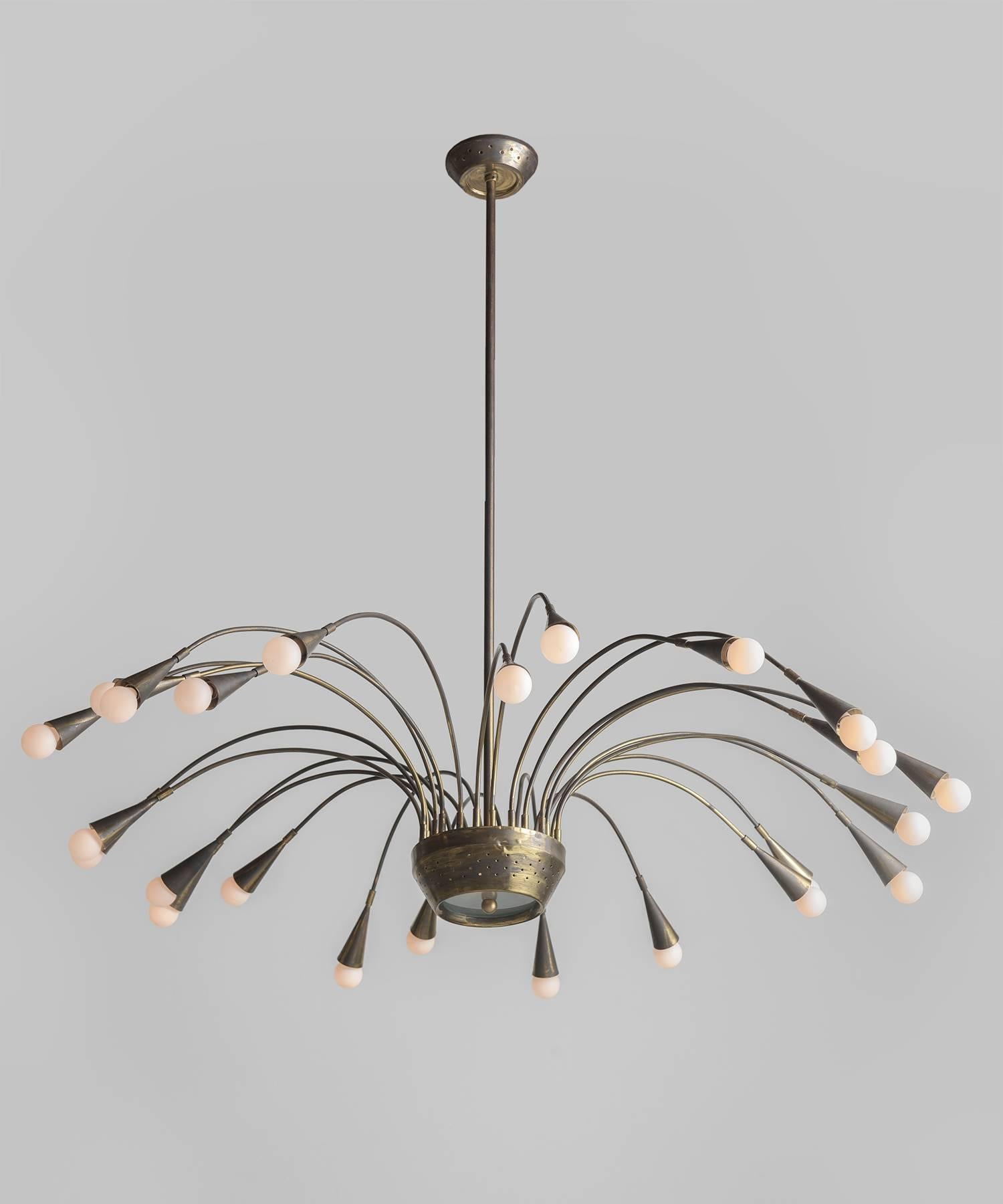 Stilnovo Brass Chandelier, circa 1950

Wonderfully patinated with a perforated centerpiece that supports (24) lights. 

11
