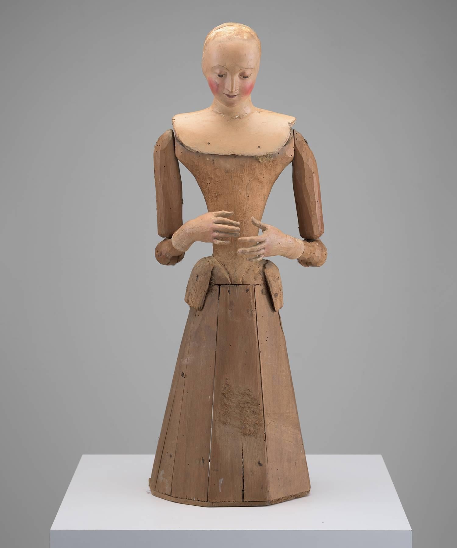 Wooden figure with open back and original paint.