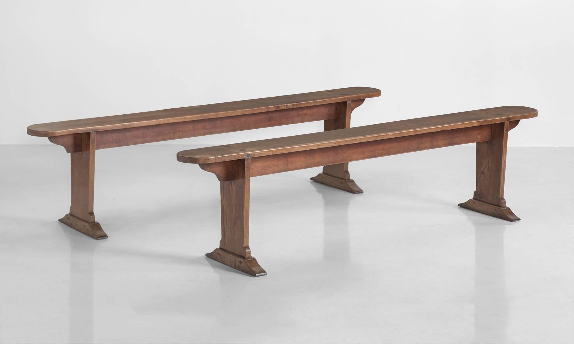 Cherrywood bench, circa 1850.

Solid cherrywood bench with rounded edge, on taper legs and sledge feet.