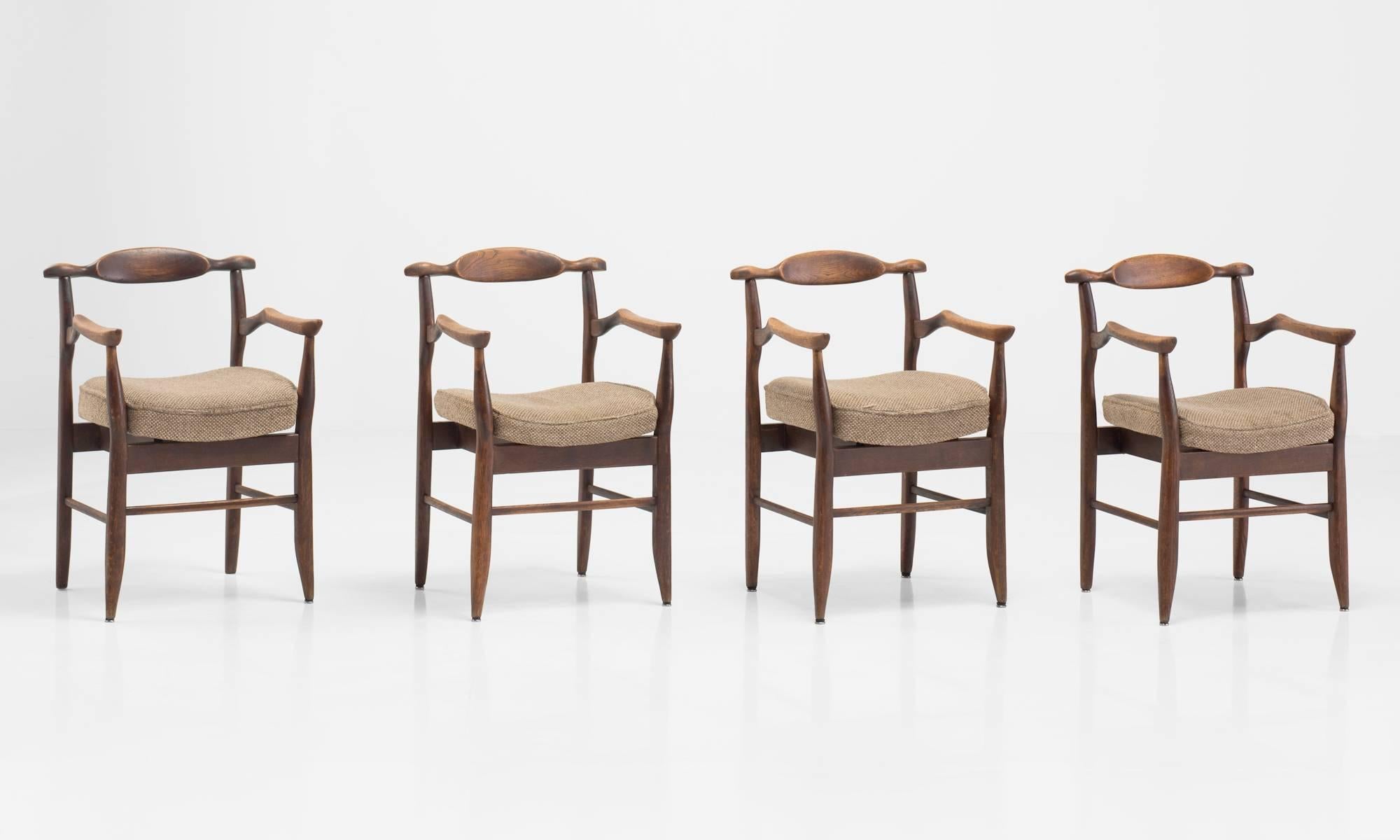 Guillerme et Chambron armchairs, circa 1960.

Oak frame with original wool upholstery, designed by Jacques Chambron and Robert Guillerme.
